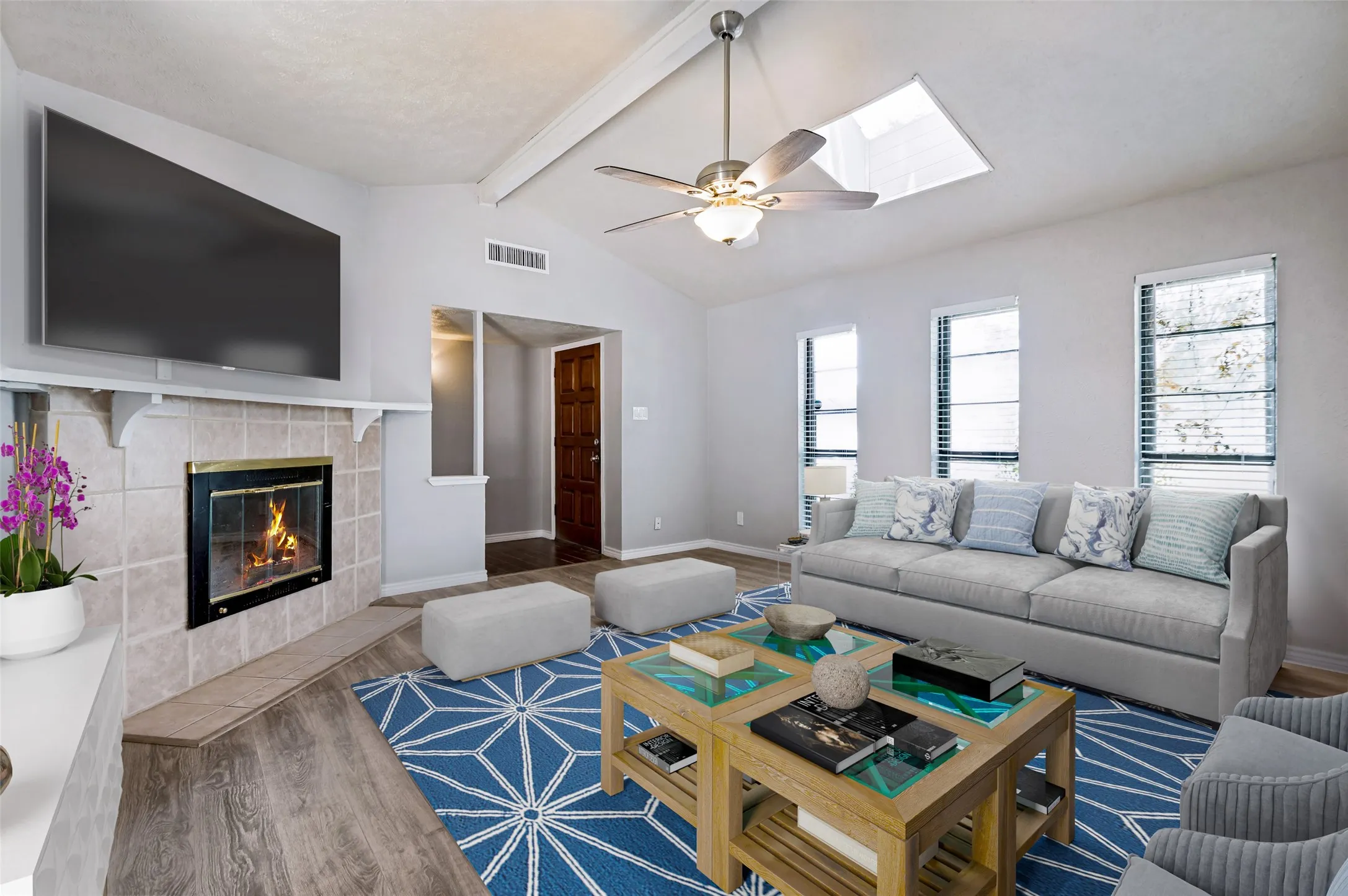 The wood burning fireplace adds to function of the room, although you may use the ceiling fan more when you move in, but Texas will cool down and the fireplace will be a great feature.