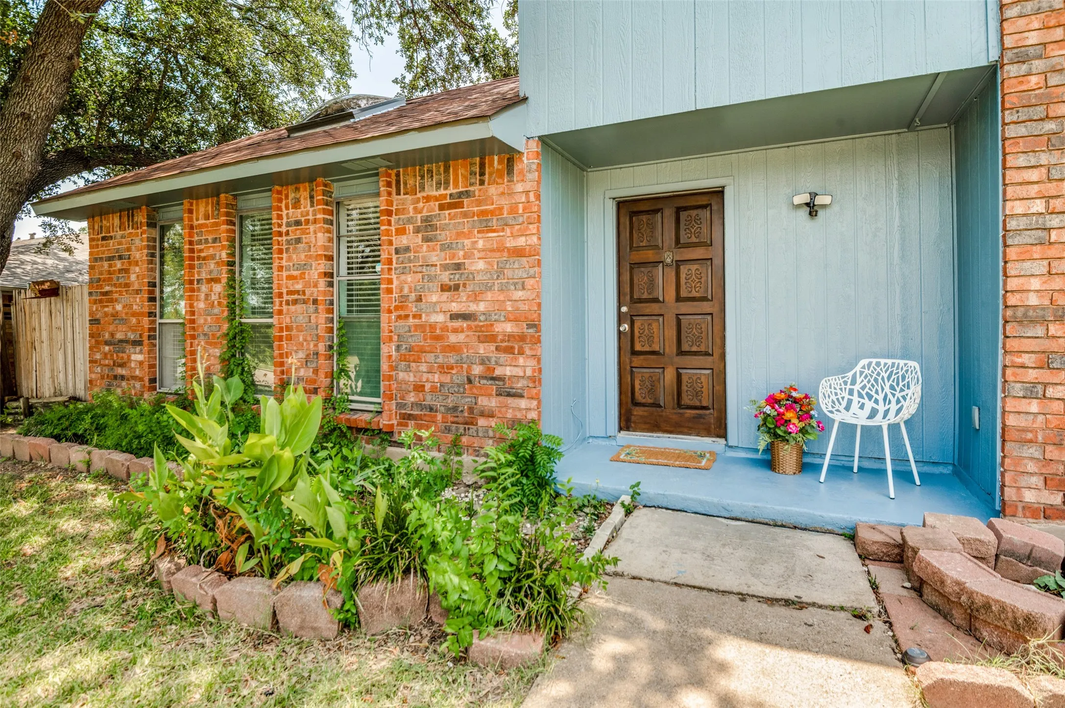 The front porch welcomes you to this newly updated home
