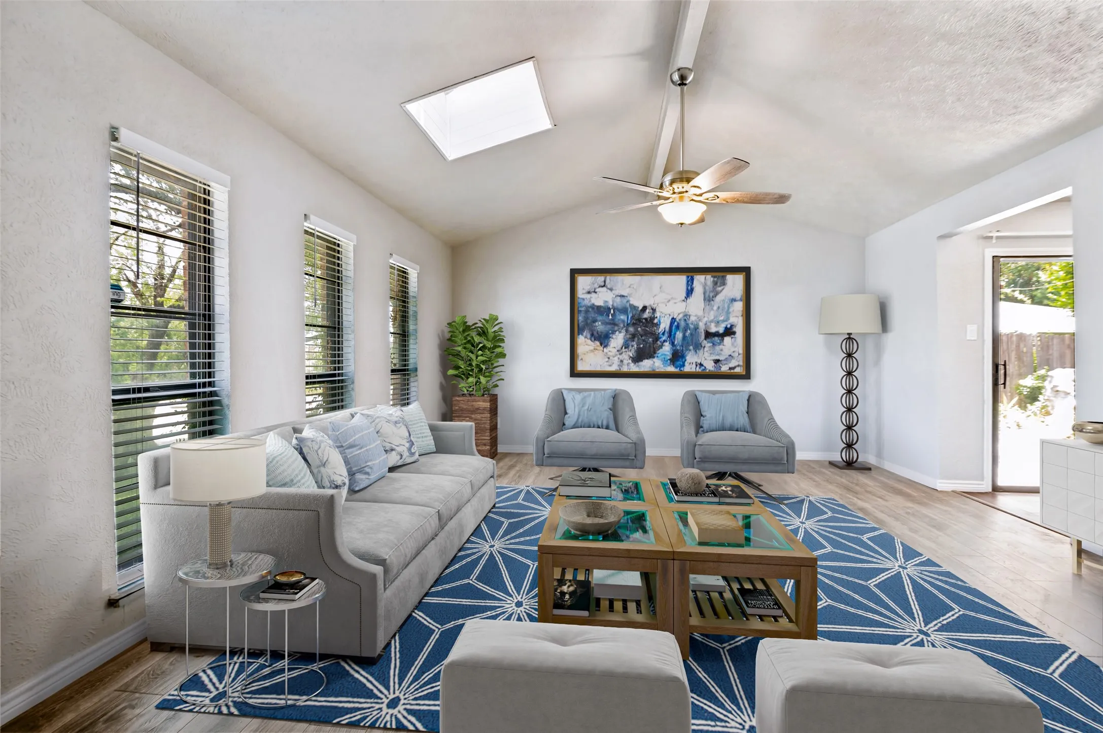 This spacious living area has new easy care luxuory vinyl plank flooring as well as paint and 2" blinds.  The high ceilings, skylight and 3 great windows all help provide the wonderful abundance for nataural lighti. Entertaining or just enjoying family down-time will be easy in this room.