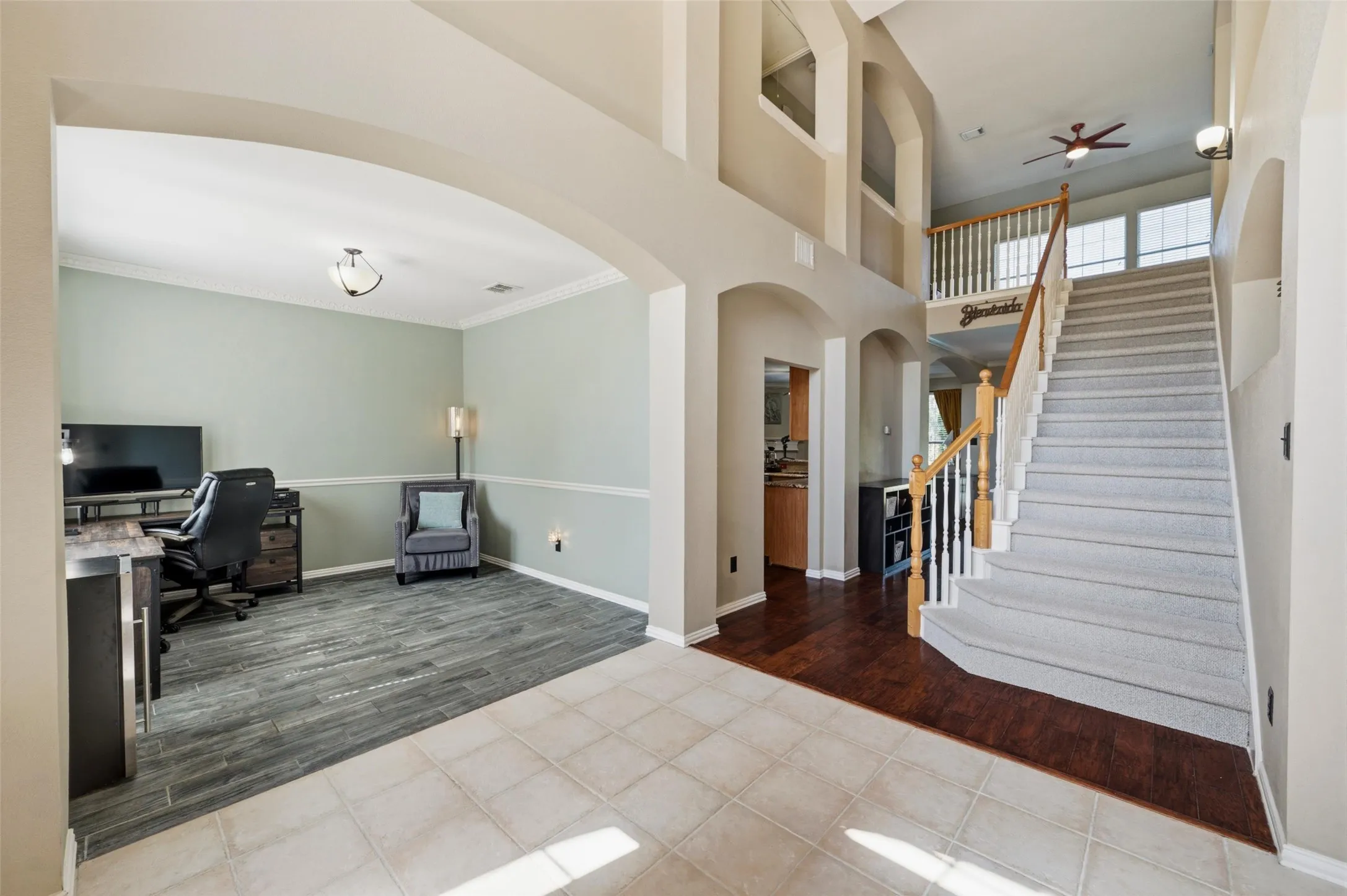 Entry with formal dining room which is currently being used as an office