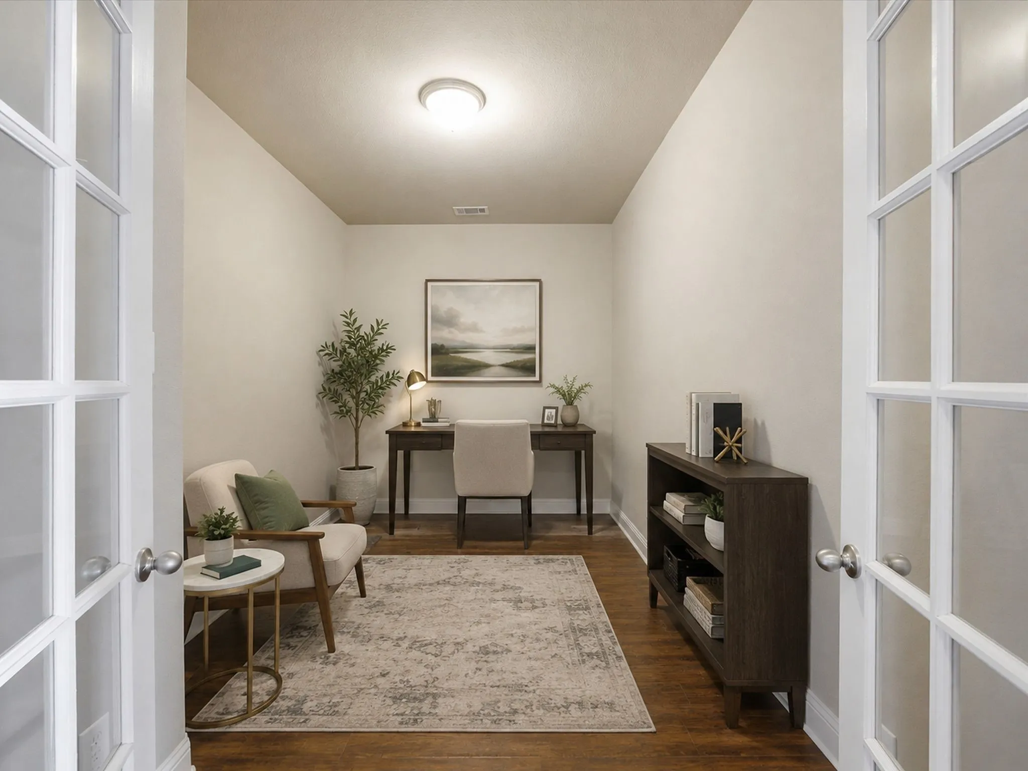 Wood-finish flooring, recessed ceiling lighting, and french doors with frosted glass panels