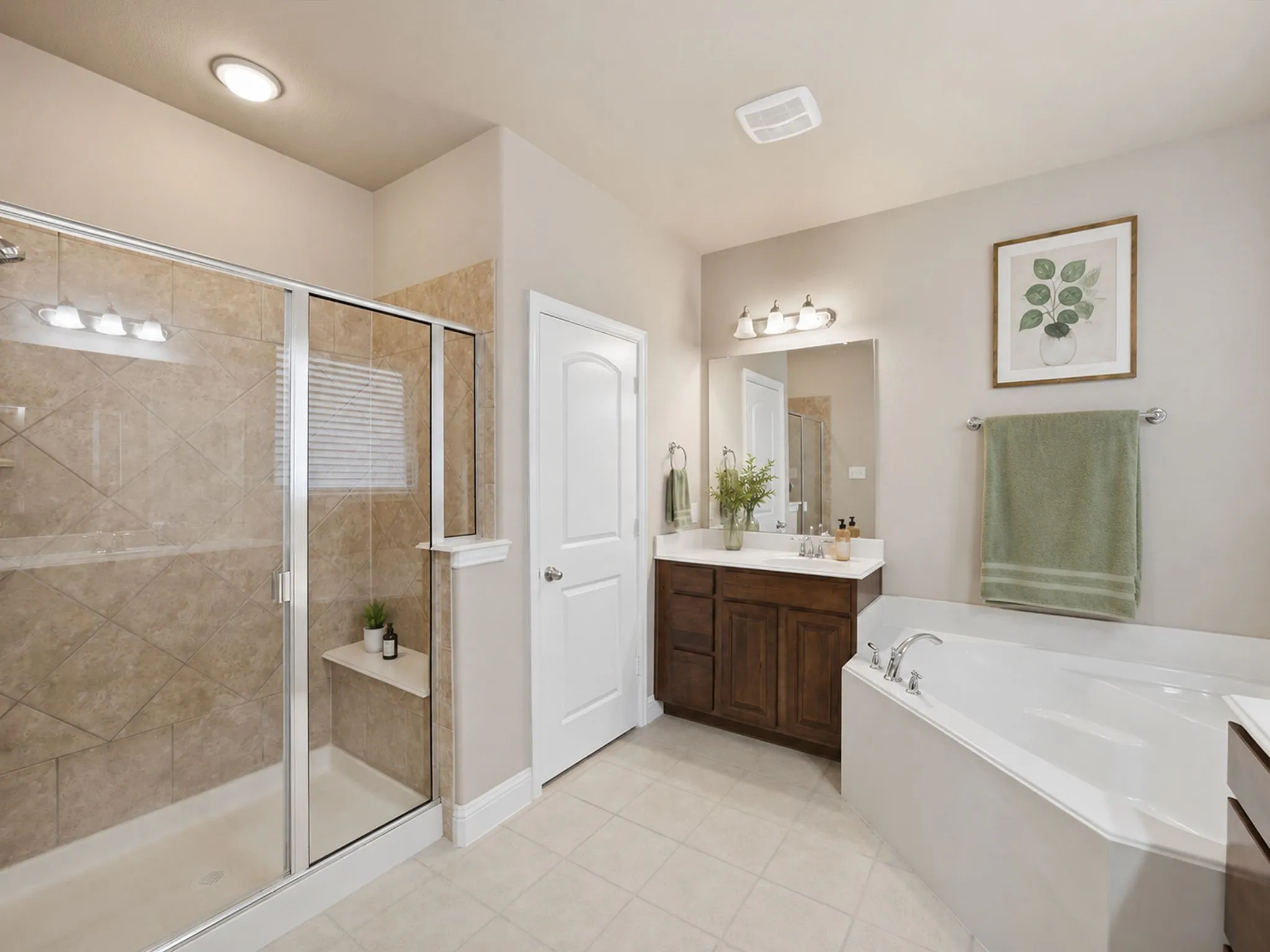 Step-in shower with clear glass enclosure and integrated bench, separate soaking tub, and single vanity with a white countertop