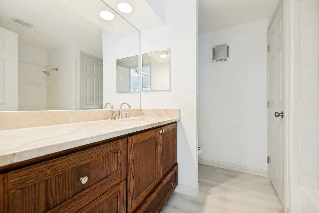 Bathroom with new paint color and new floor.