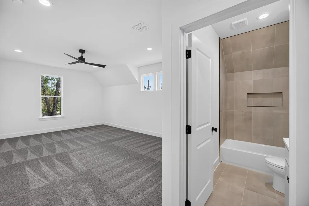 upstairs bonus room with bathroom
