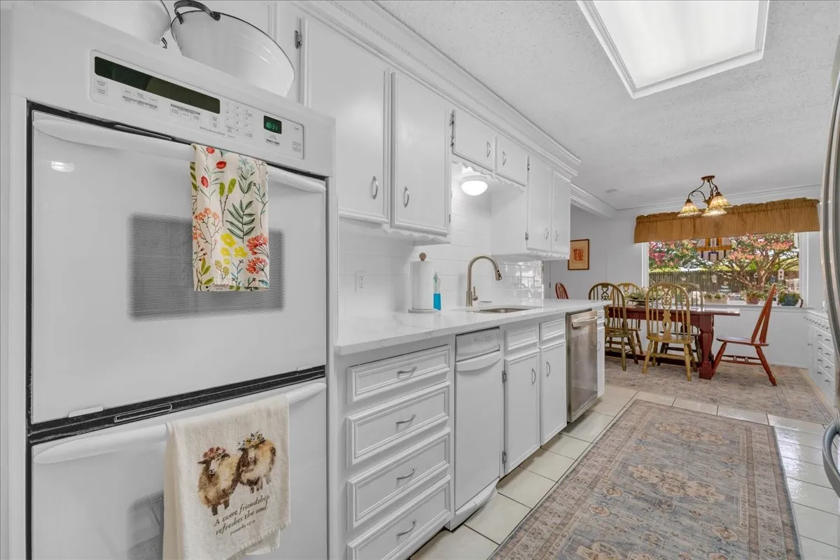 Double ovens and farm sink.