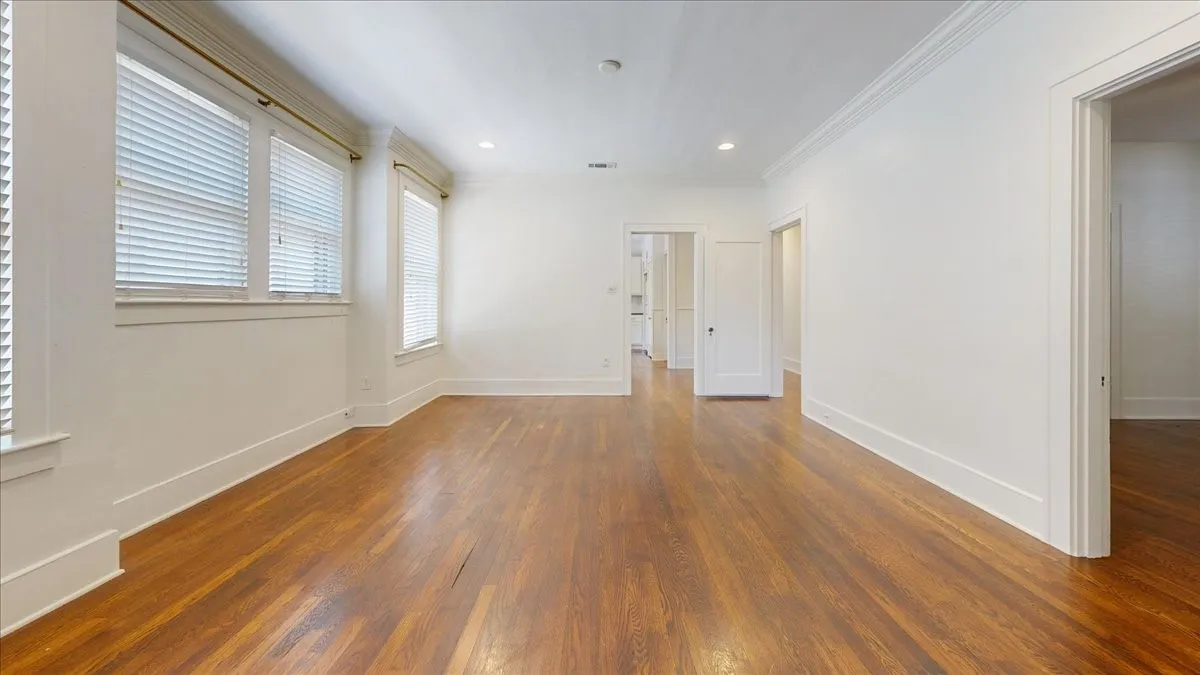 Secondary Living area or formal dining, without furniture.