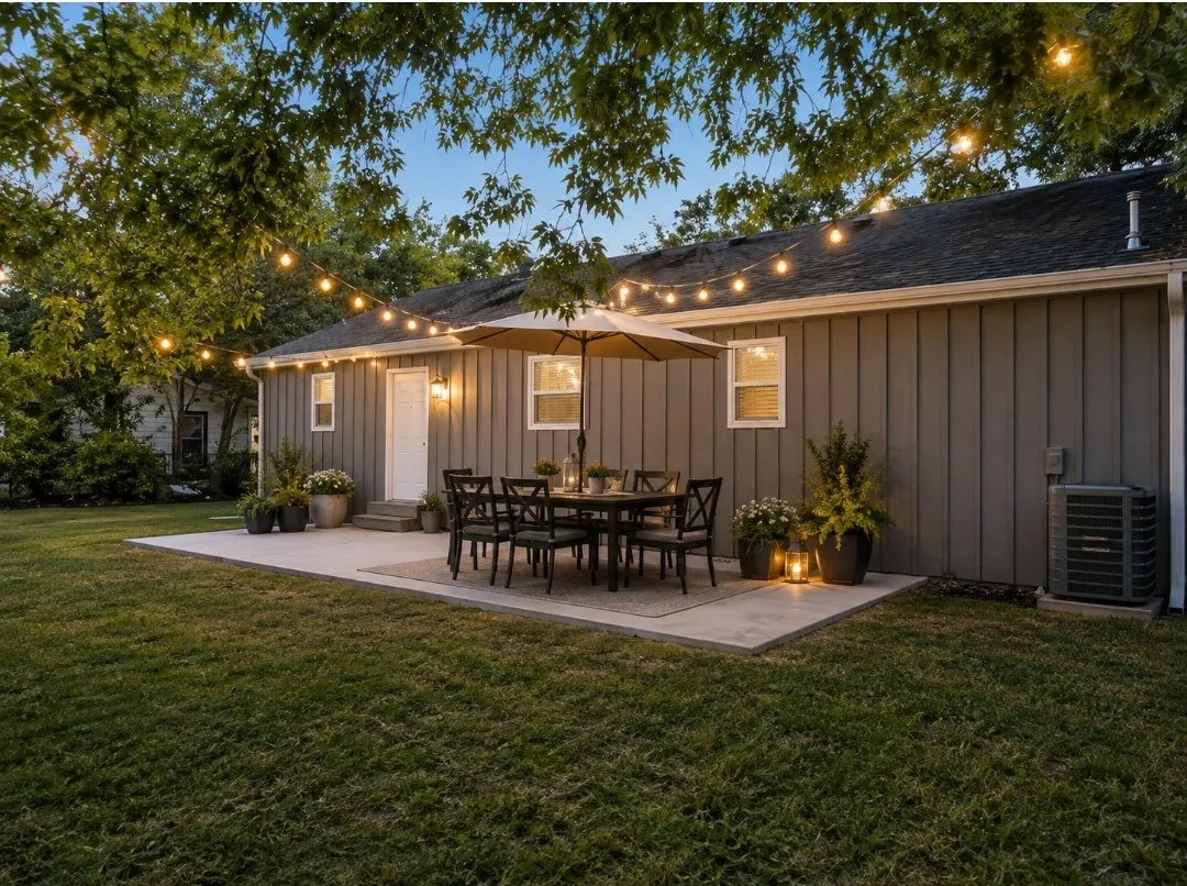 Expansive concrete patio with direct outdoor access. Image has been virtually staged.