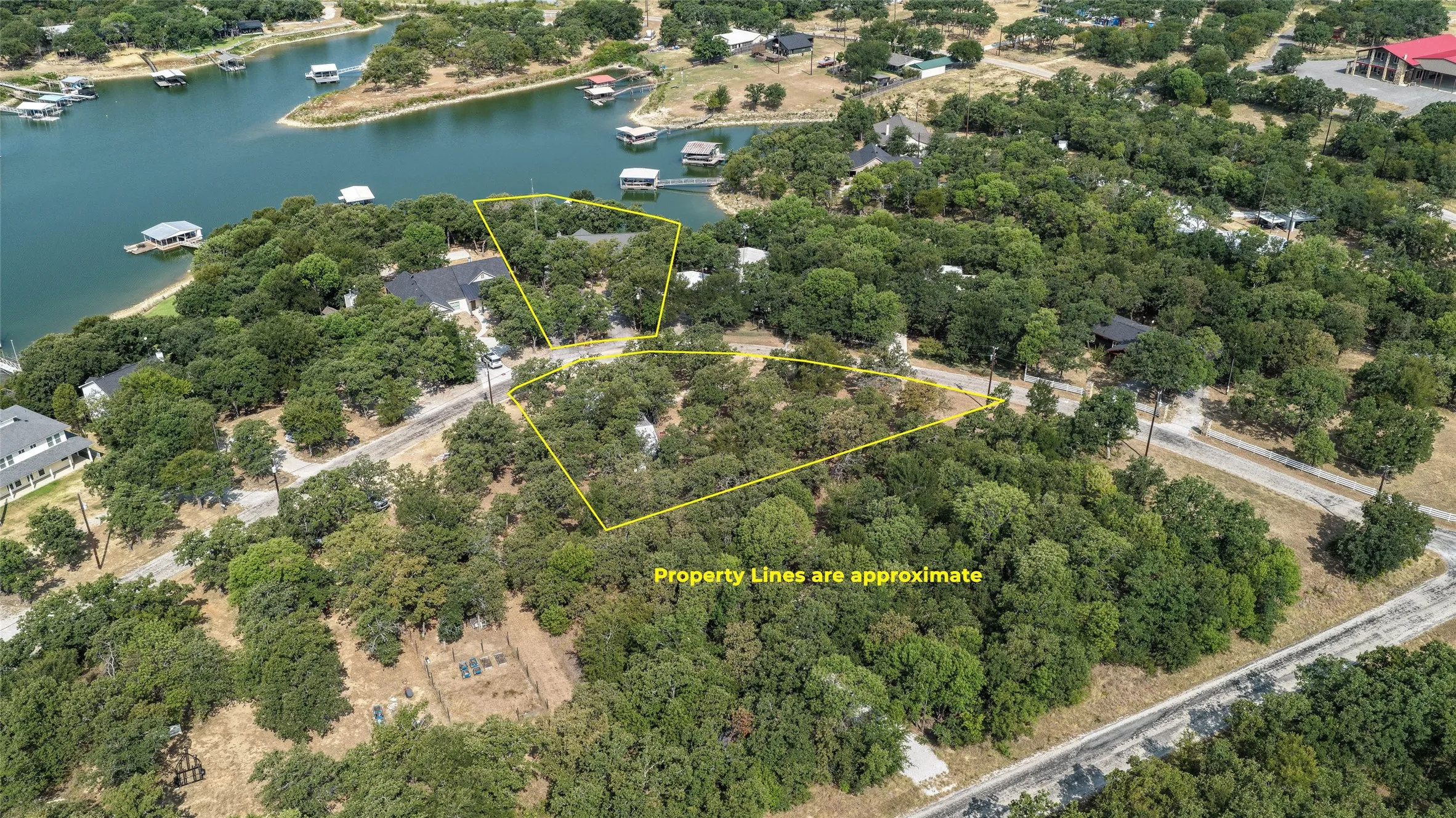 Lakeside property with extensive tree coverage and direct water access