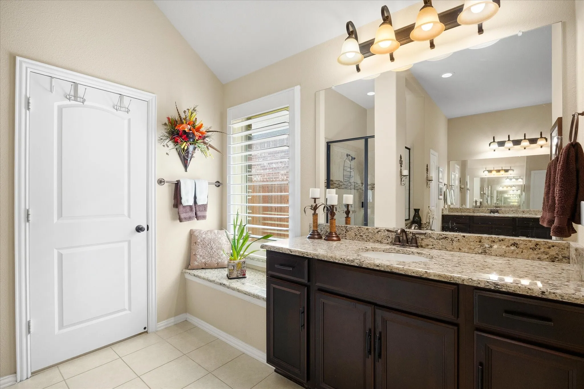 Master bath includes his and her vanities and walk in closet