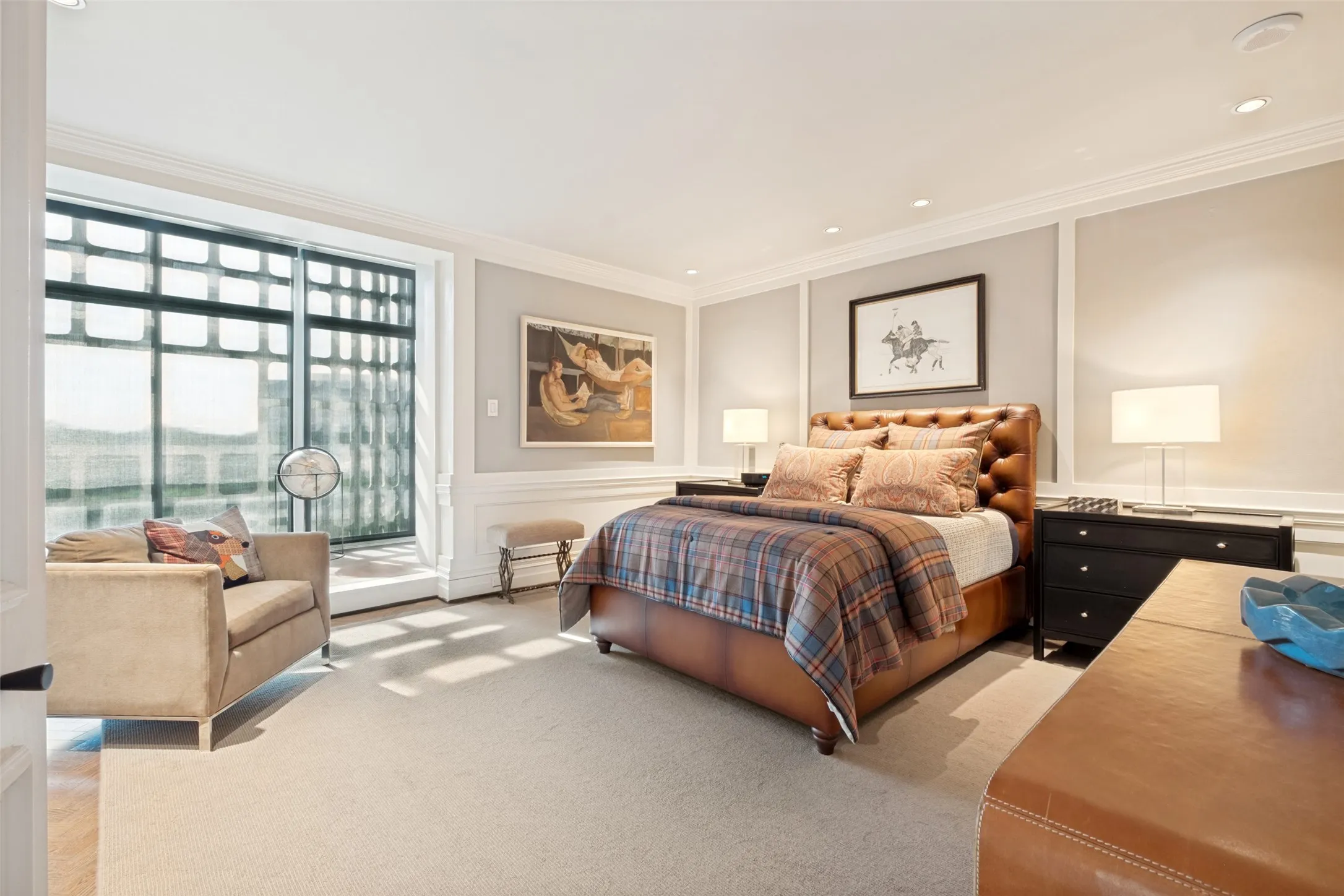 The large windows let in an abundance of natural light.