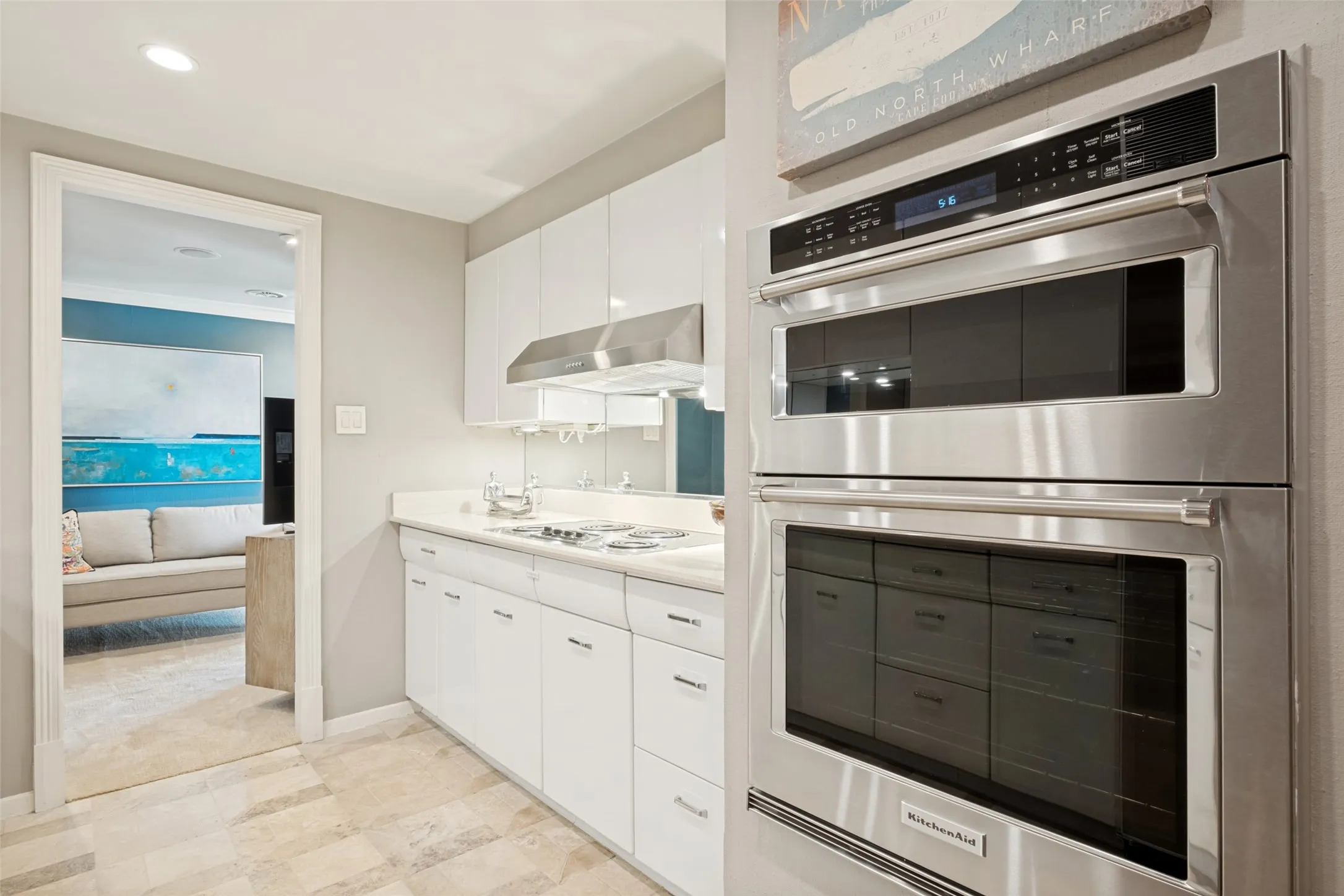 The oven and built-in microwave are stainless steel.