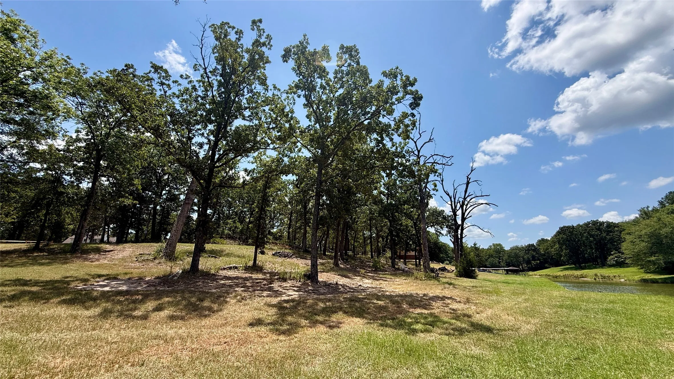 Spacious natural building area surrounded by mature trees adds character to these Southside Shores waterfront lots.