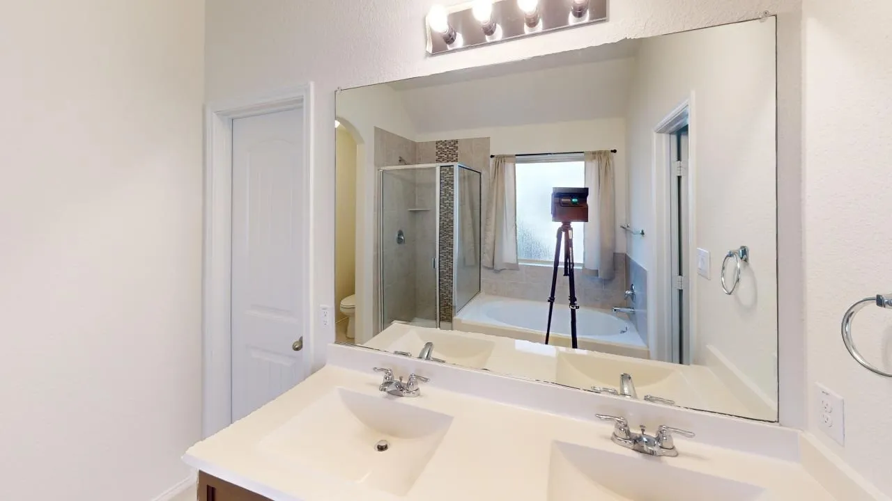 Dual vanity with undermount sinks and chrome fixtures