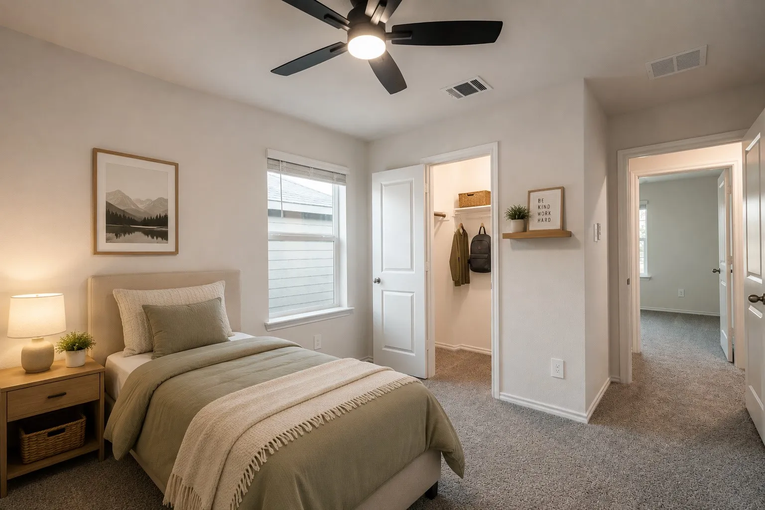 3rd bedroom on second floor featuring newly installed ceiling fan and a spacious closet.