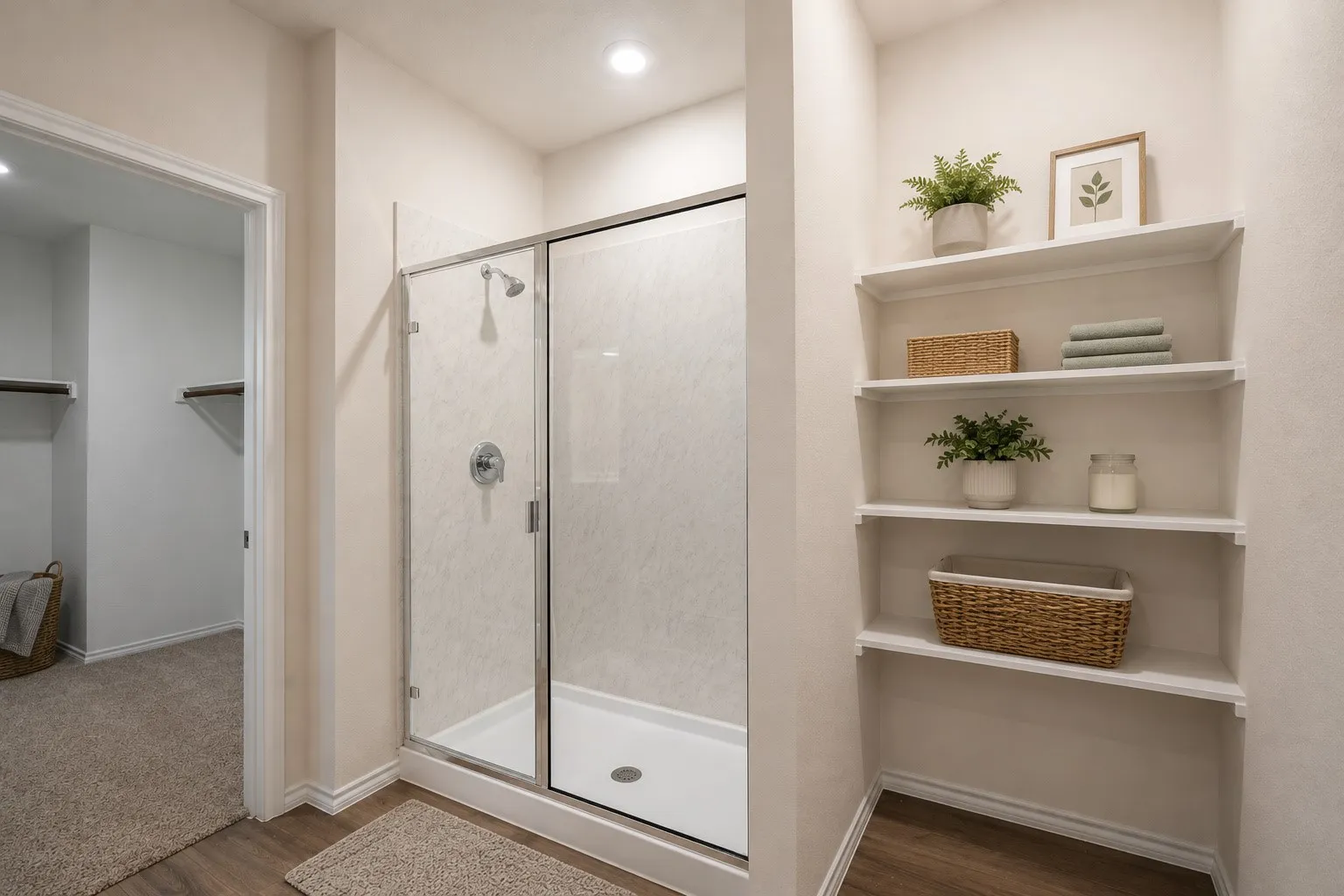 Spacious standing shower. Built-ins for linen.