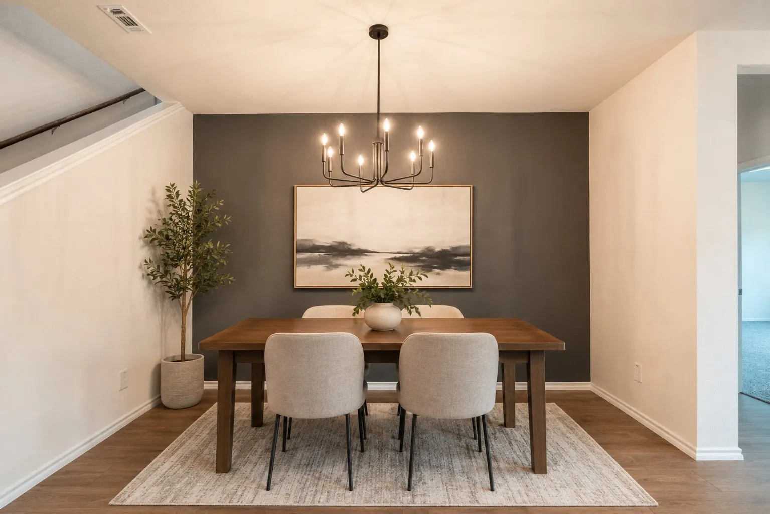ustom painted accent wall by artist. Beautiful light fixture added by owners to enhance and bring warmth to this elegant space.