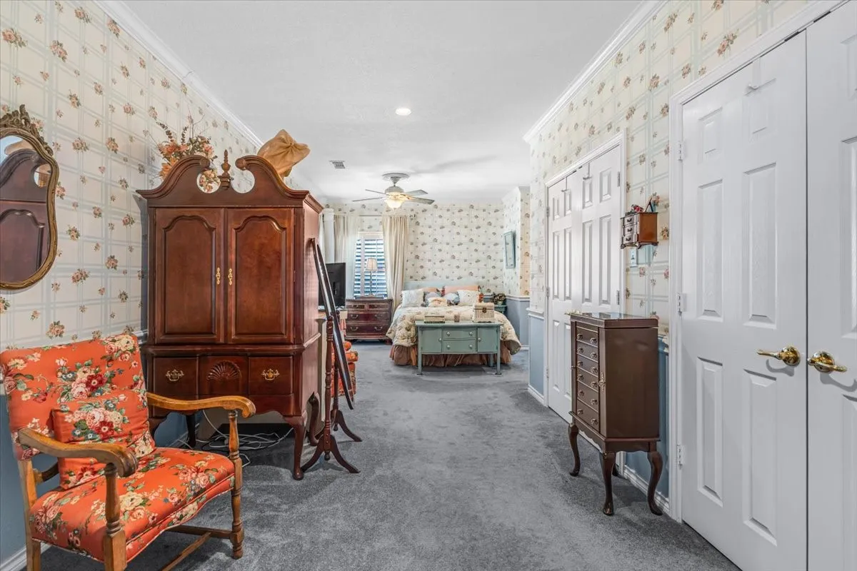 Recessed lighting, ceiling fan, carpet flooring, and white paneled doors