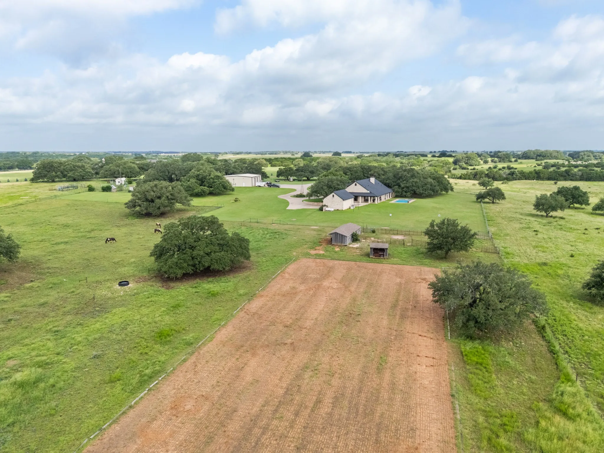 Horse barn, hay barn and riding arena