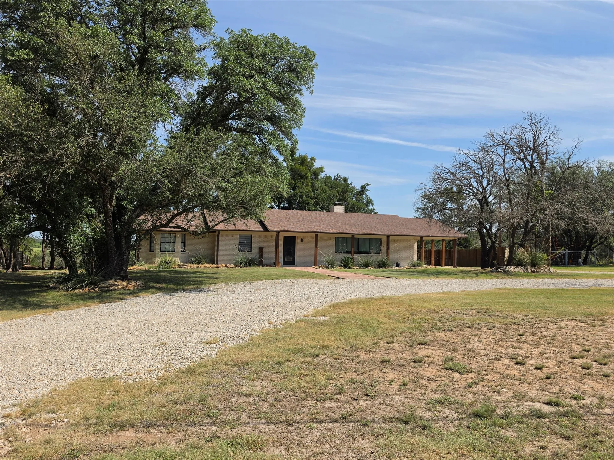 Single-story residence featuring a covered entry and a covered patio
