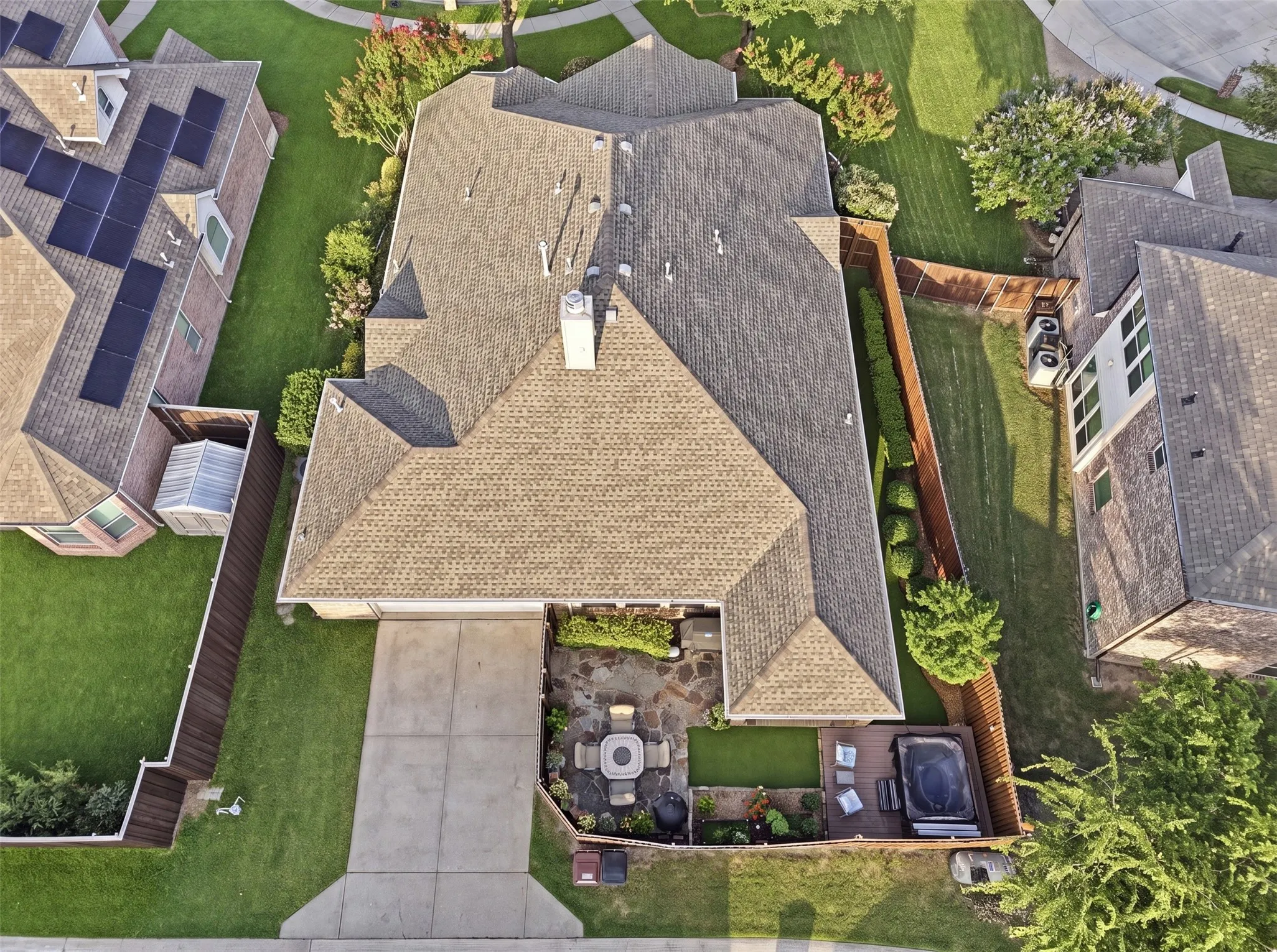 Paved driveway leading to an attached garage