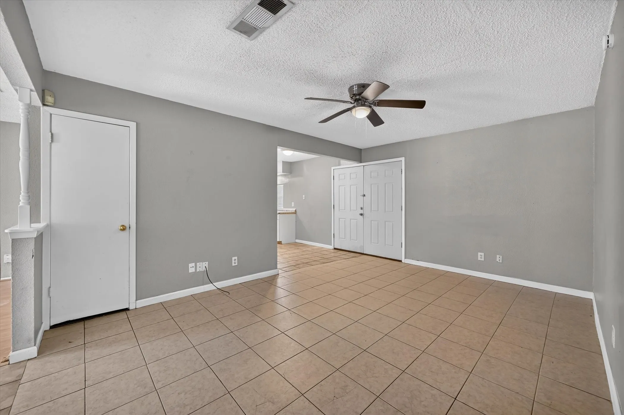 Another view highlights the generous size and versatile layout of the family room
