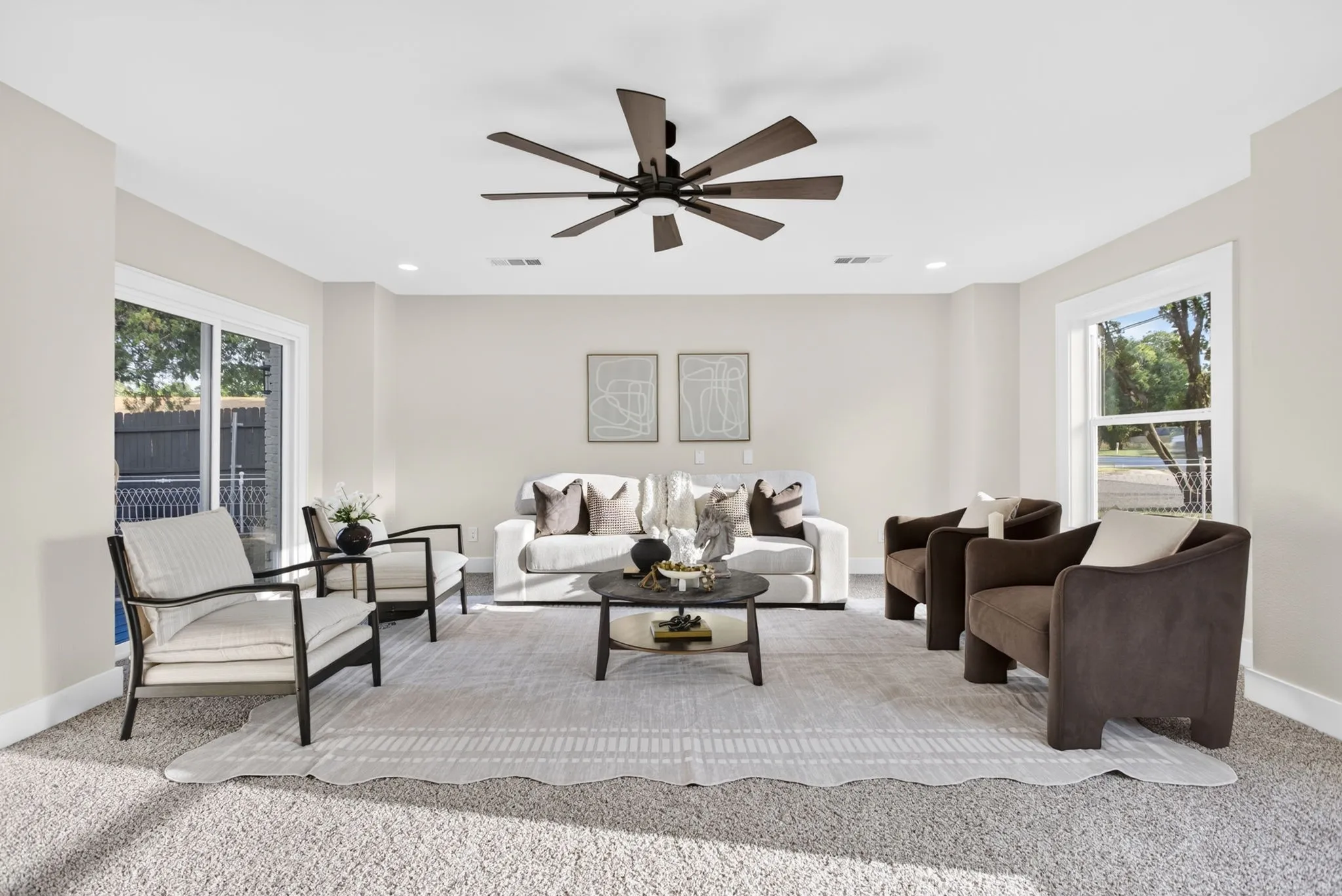Another view. The sliding glass doors lead out to a private courtyard that connects to the covered carport area.