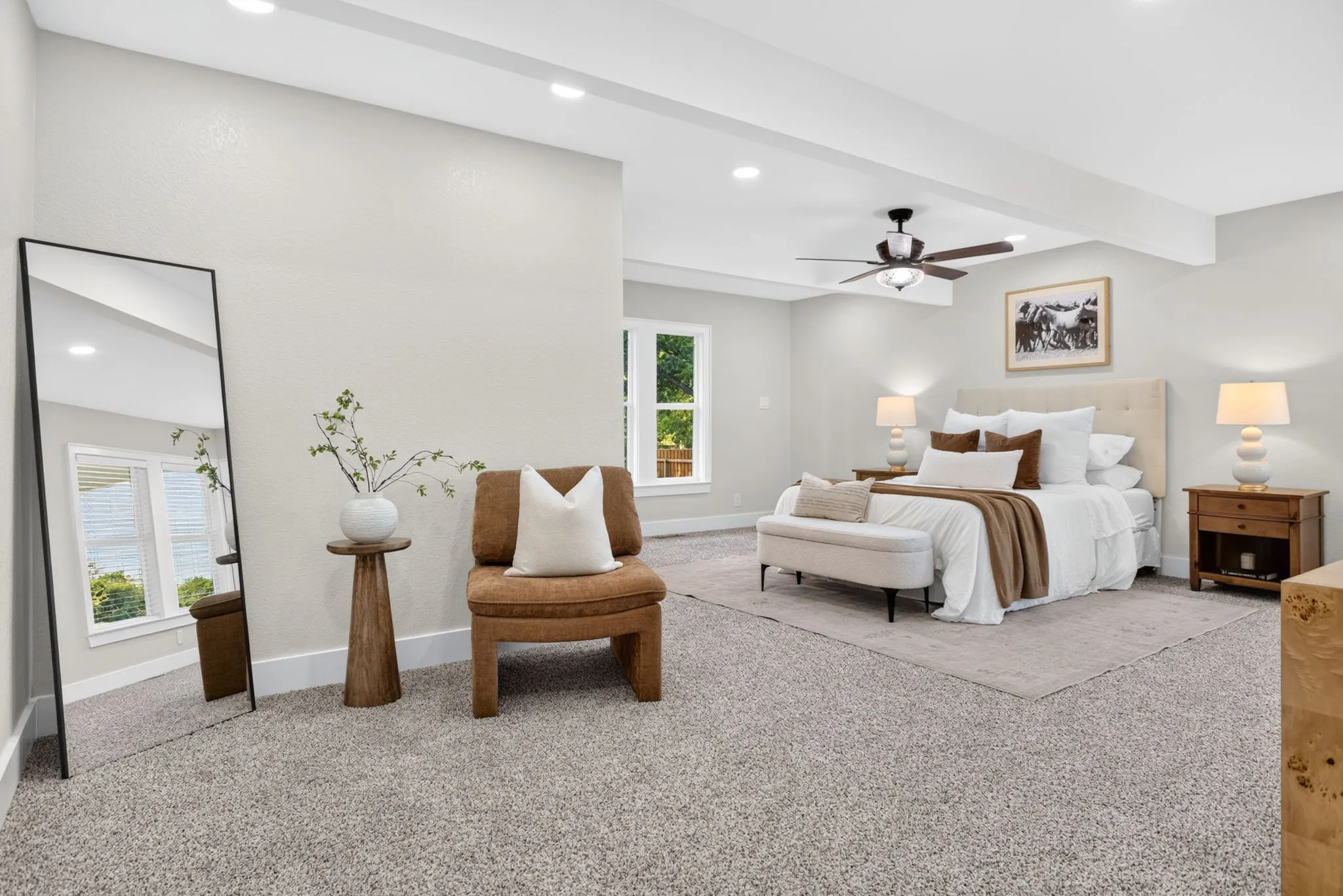 Primary suite is so sweet. Plenty of room for your king sized bed, drawers and a sitting area.