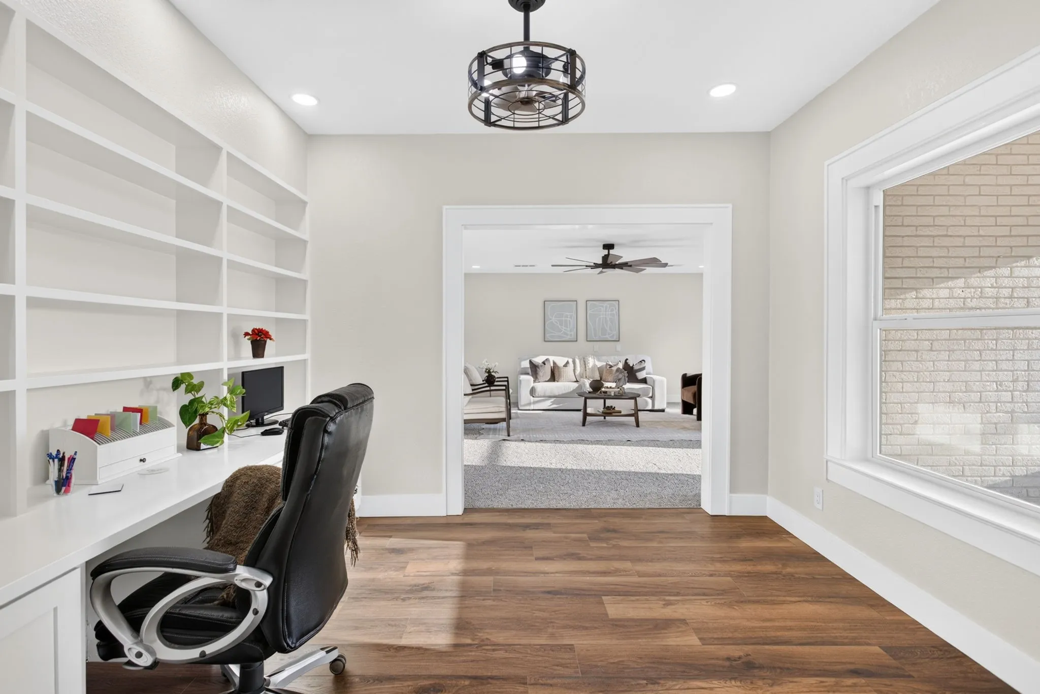 A serene space for productivity - with plenty of light and storage to boot.