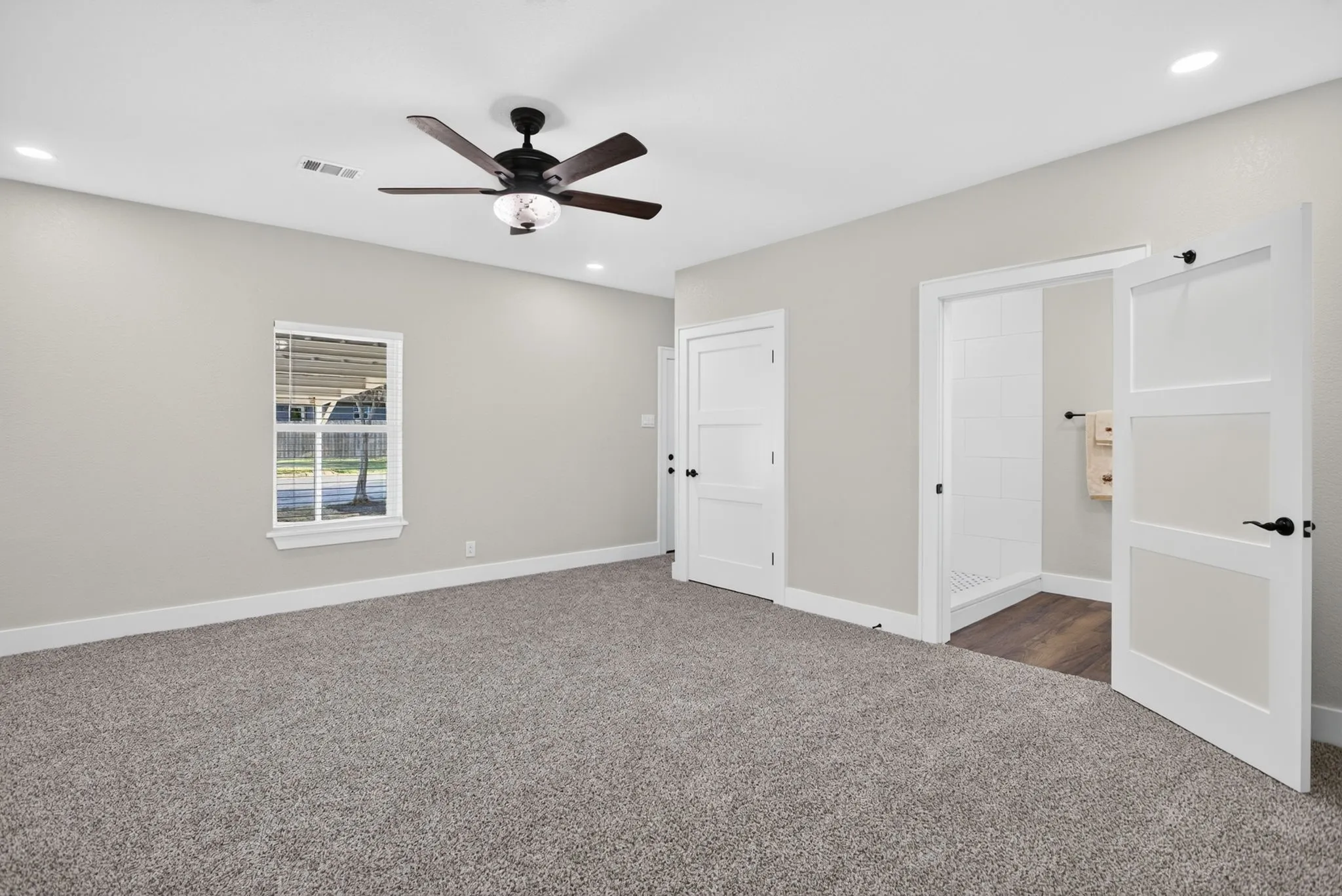 Across the way is a TRUE guest or mother-in-law suite with separate entrance, walk-in closet, and a full ensuite bathroom.