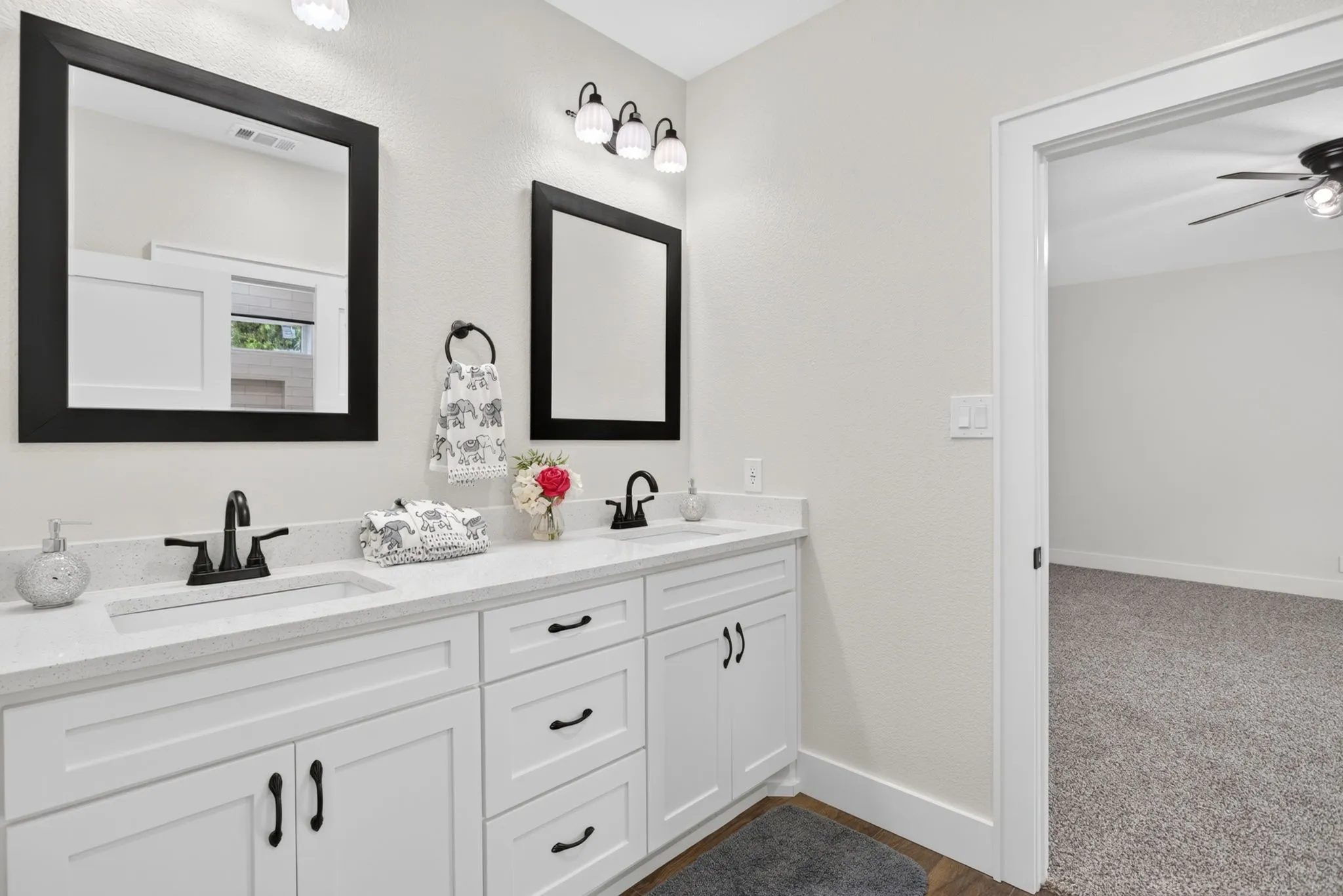 Seriously. No detail left unthought of. Dual sinks - lots of storage, and a separate toilet and shower area. Function and beauty!