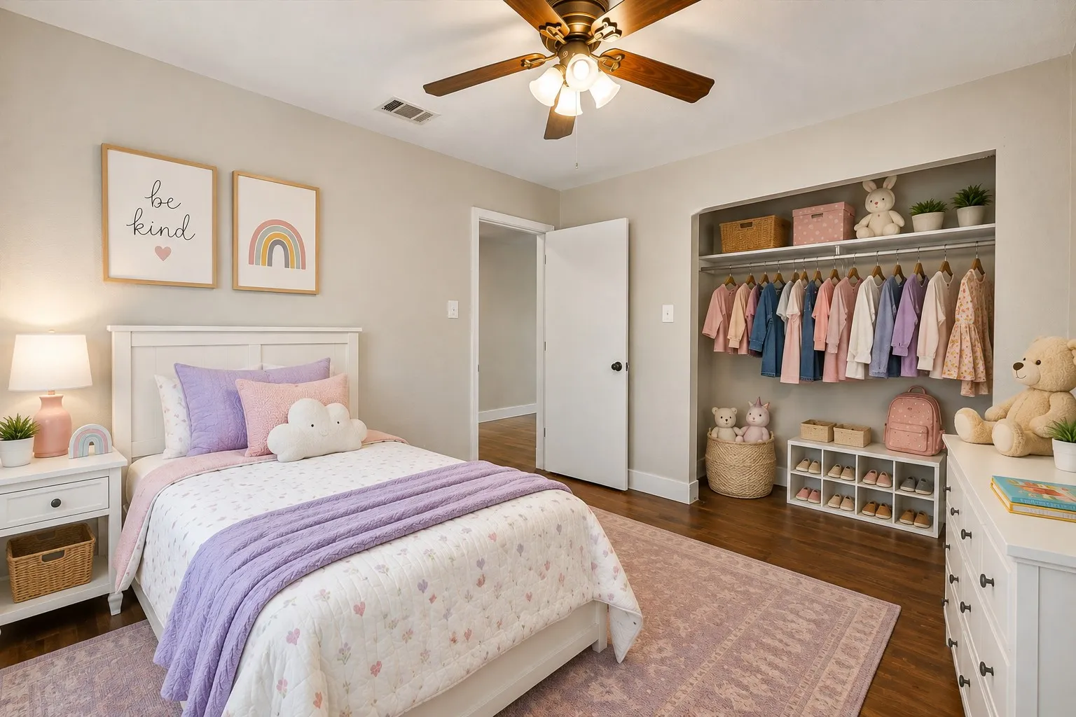 Hardwood-style flooring throughout with a ceiling fan