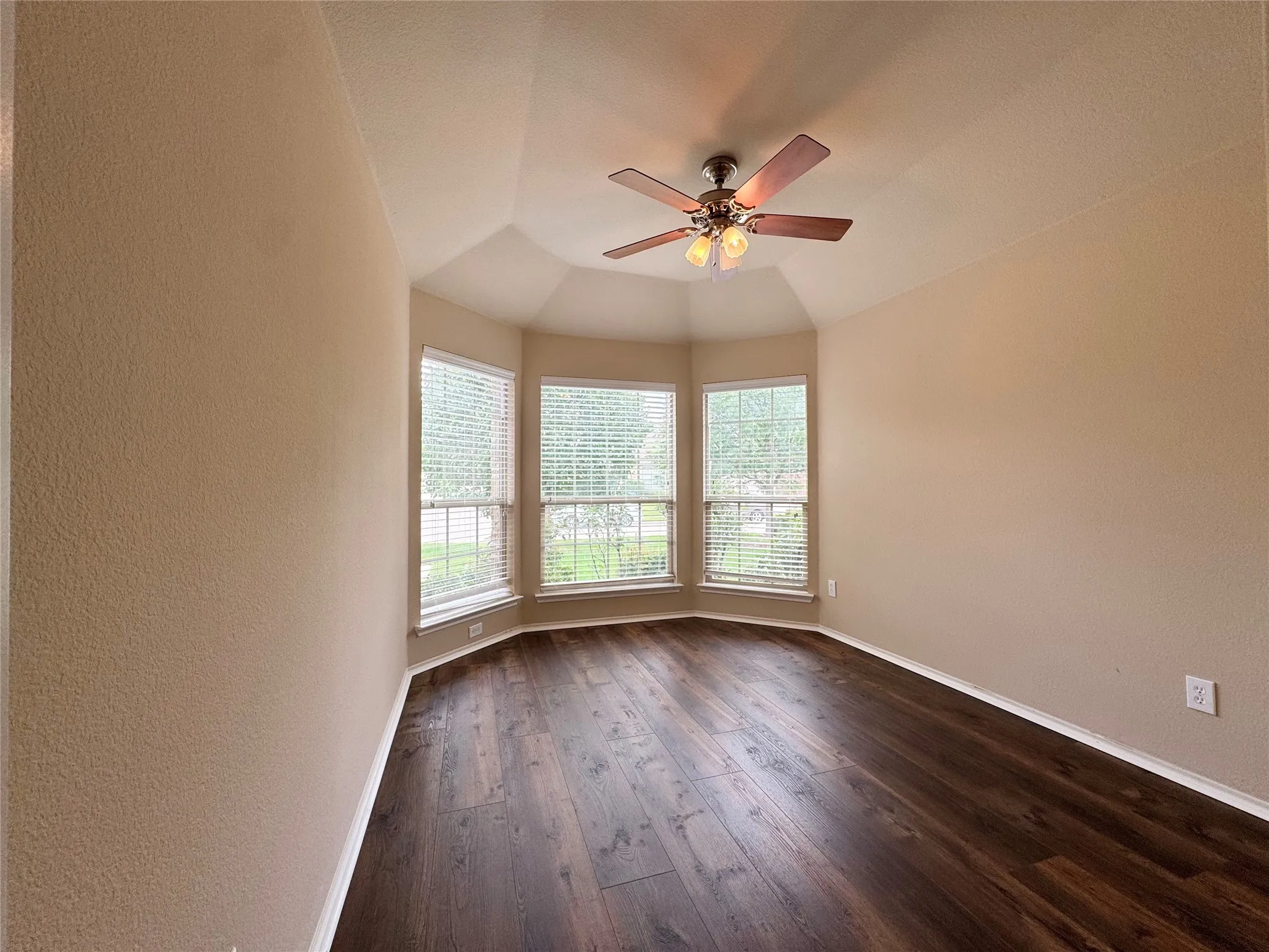 Bedroom 2 with bay windows in front of home