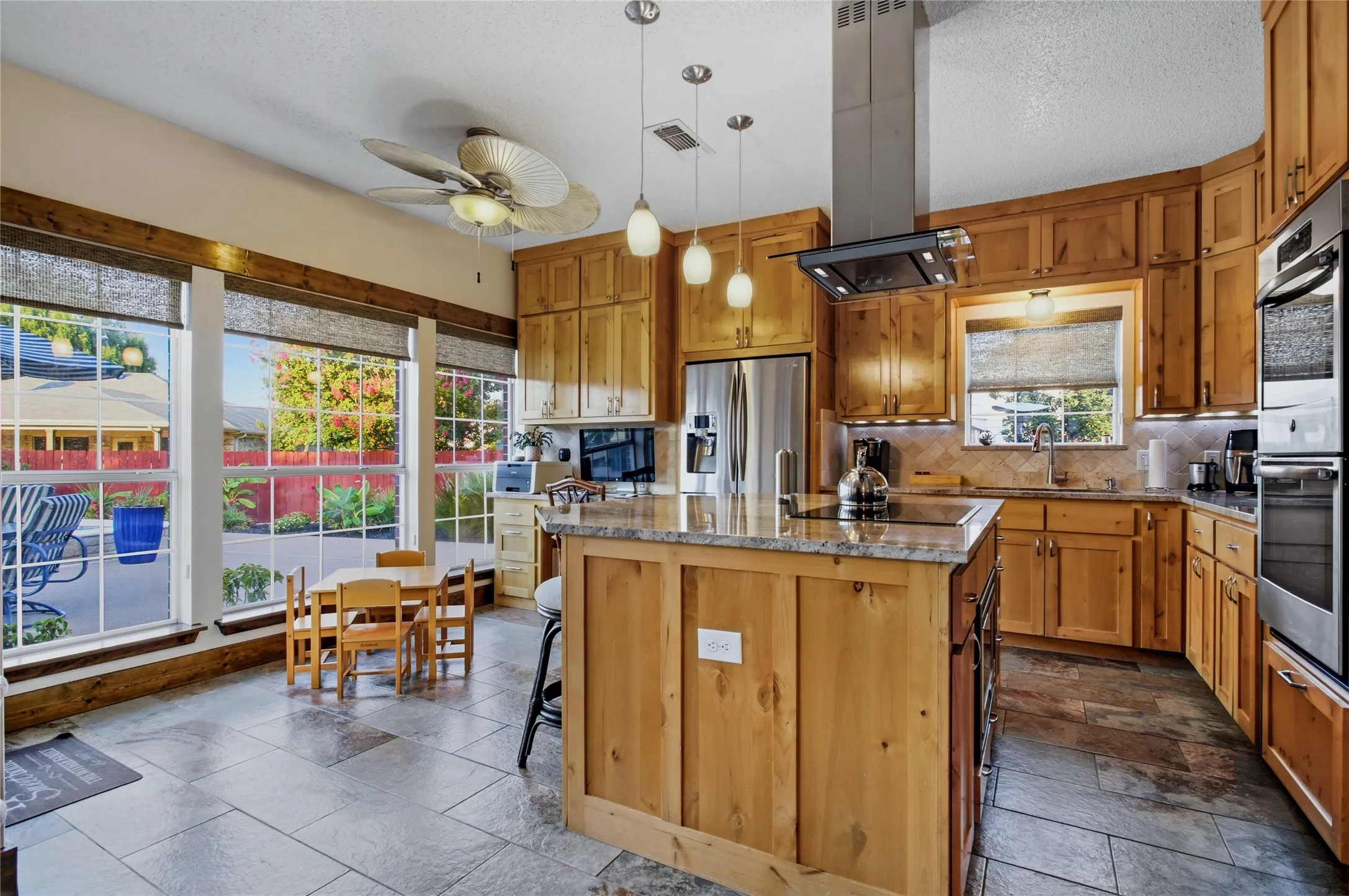 Renovated and brought to contemporary, enjoy the new cabinets, kitchen island and beautiful surfaces of granite.