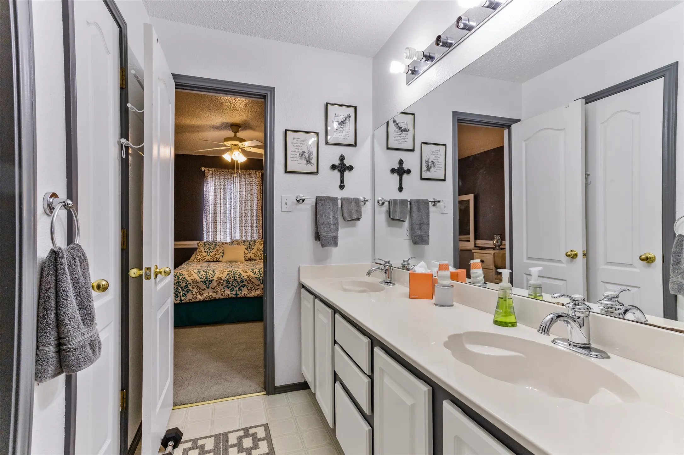 Upstairs bathroom has dual sinks for stress free prep for the day.