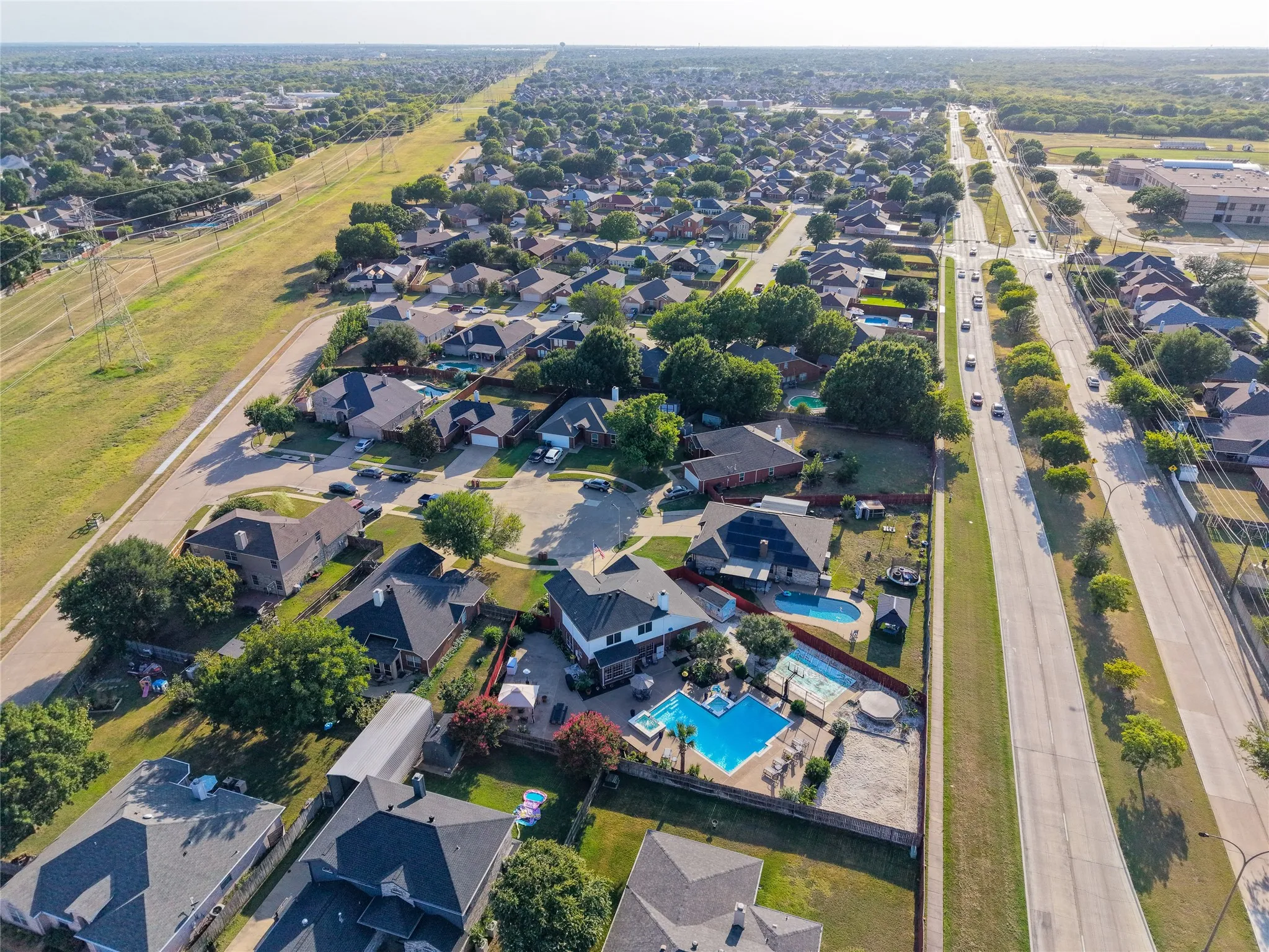 View above Sublett Road. yes, that big blog of blue backyard is 6001 Prairie Wood.