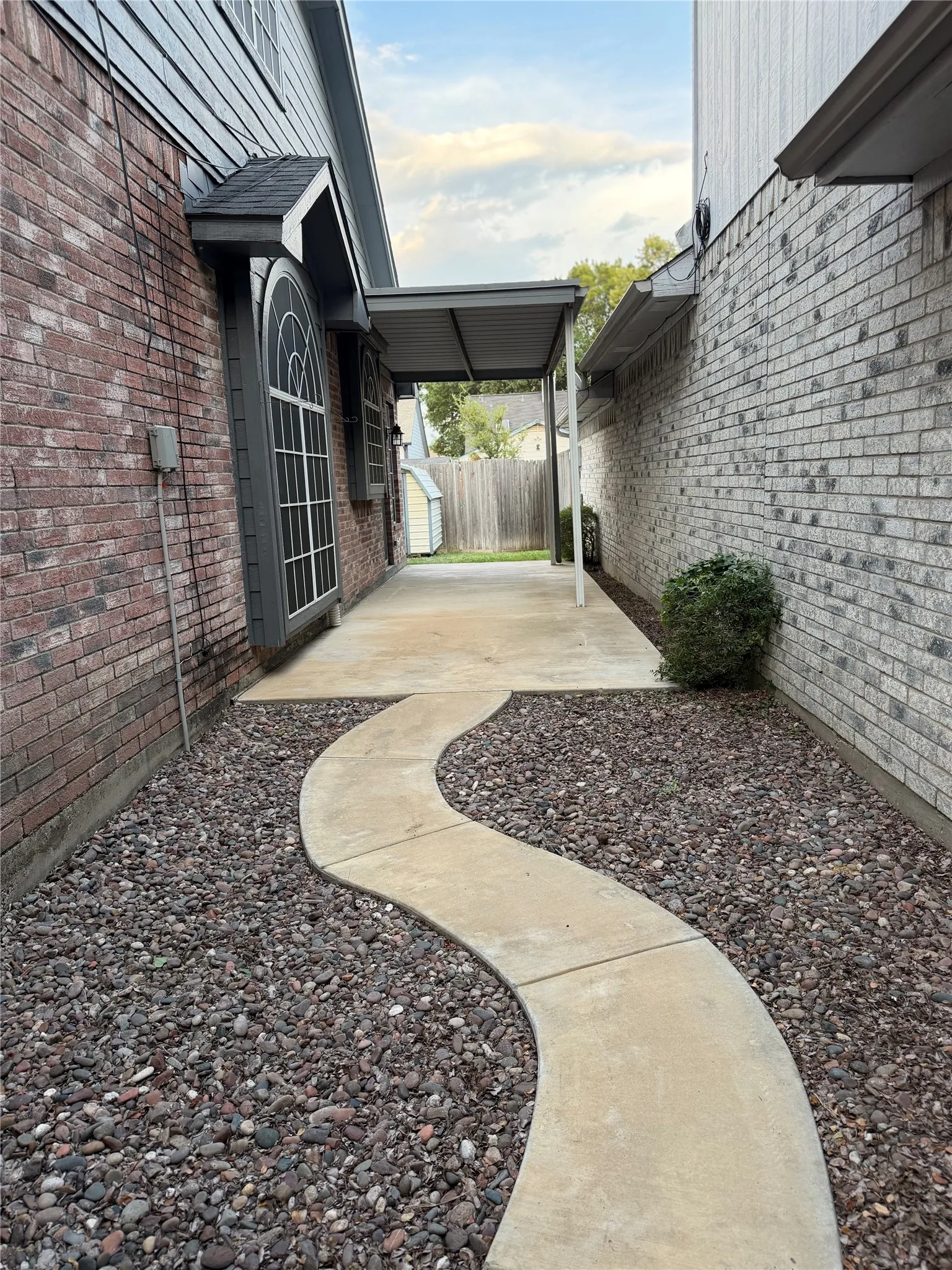 Covered Patio & walkway to and from back Door