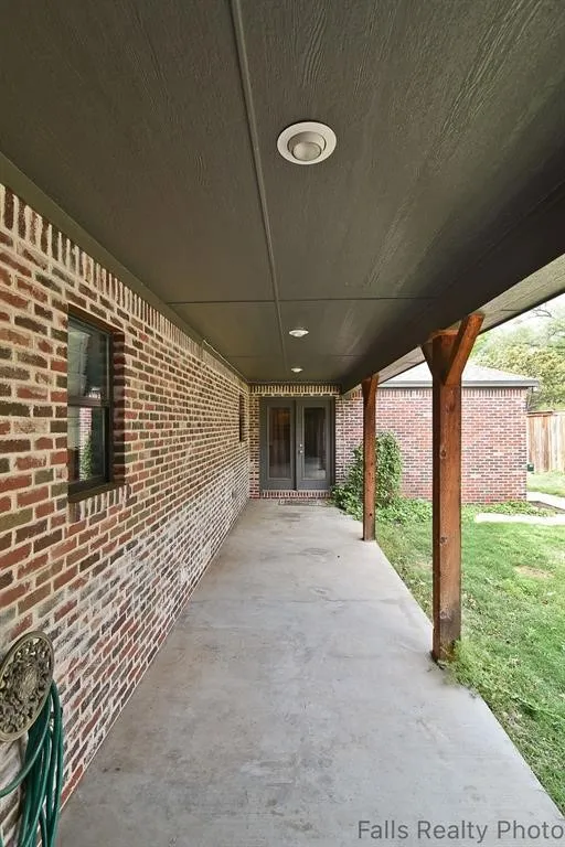 Entry to backyard from kitchen and garage