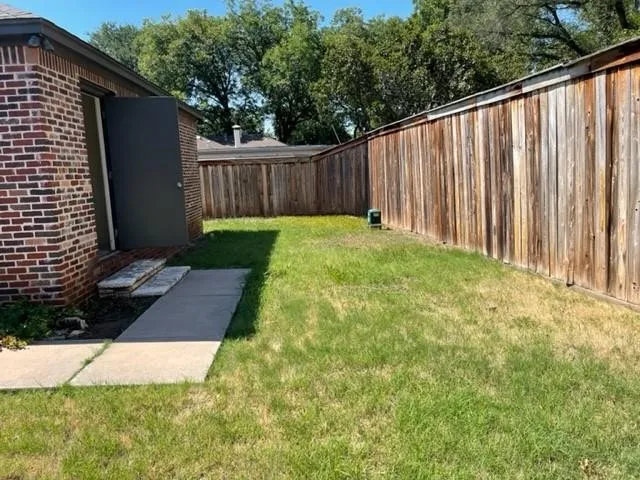 Backyard with high fence