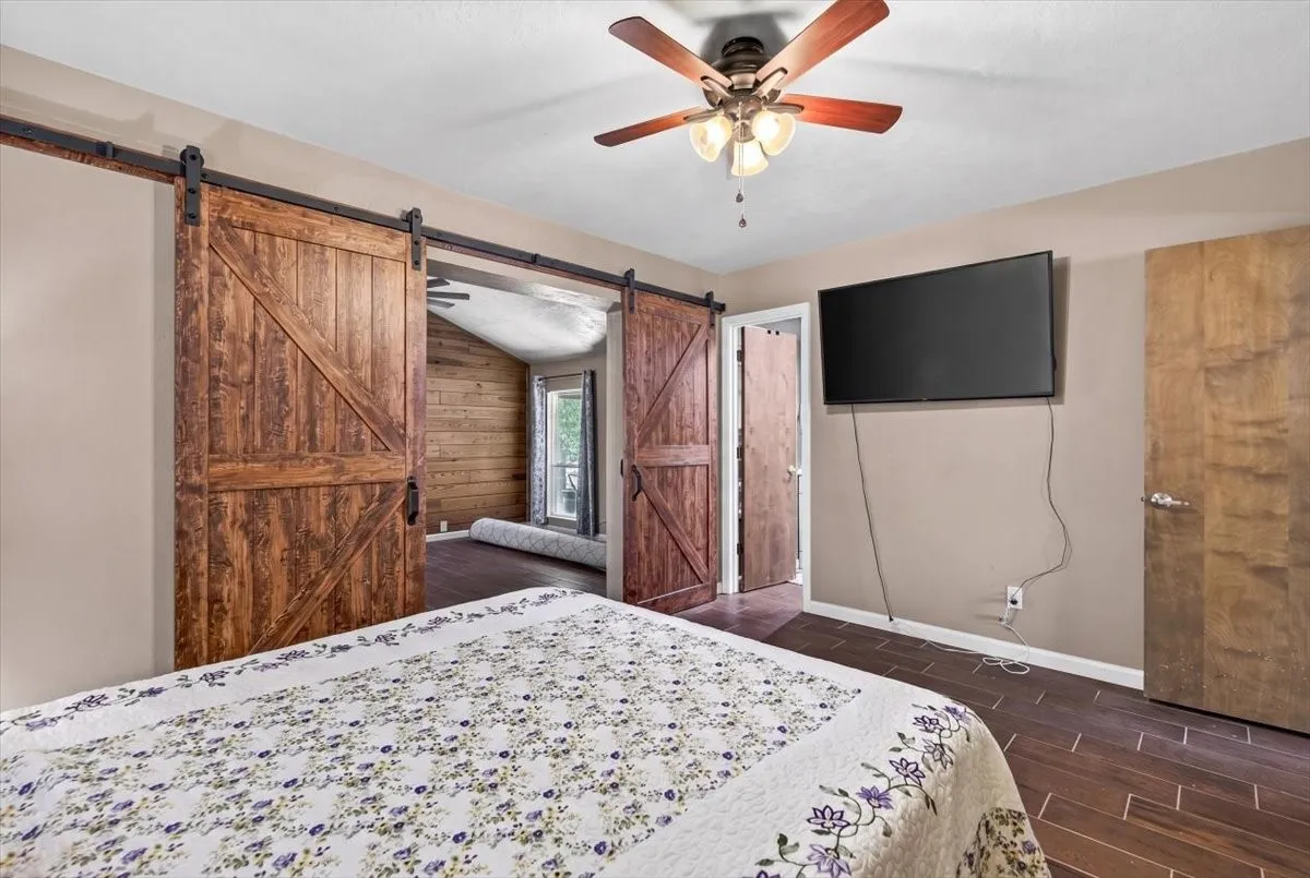 Another view of the primary bedroom