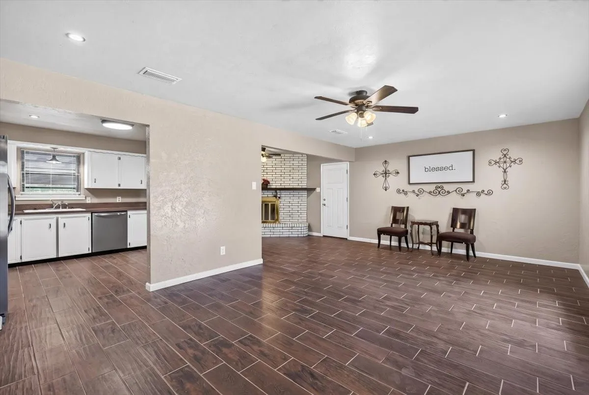 showing the floor of the living, kitchen and dining area