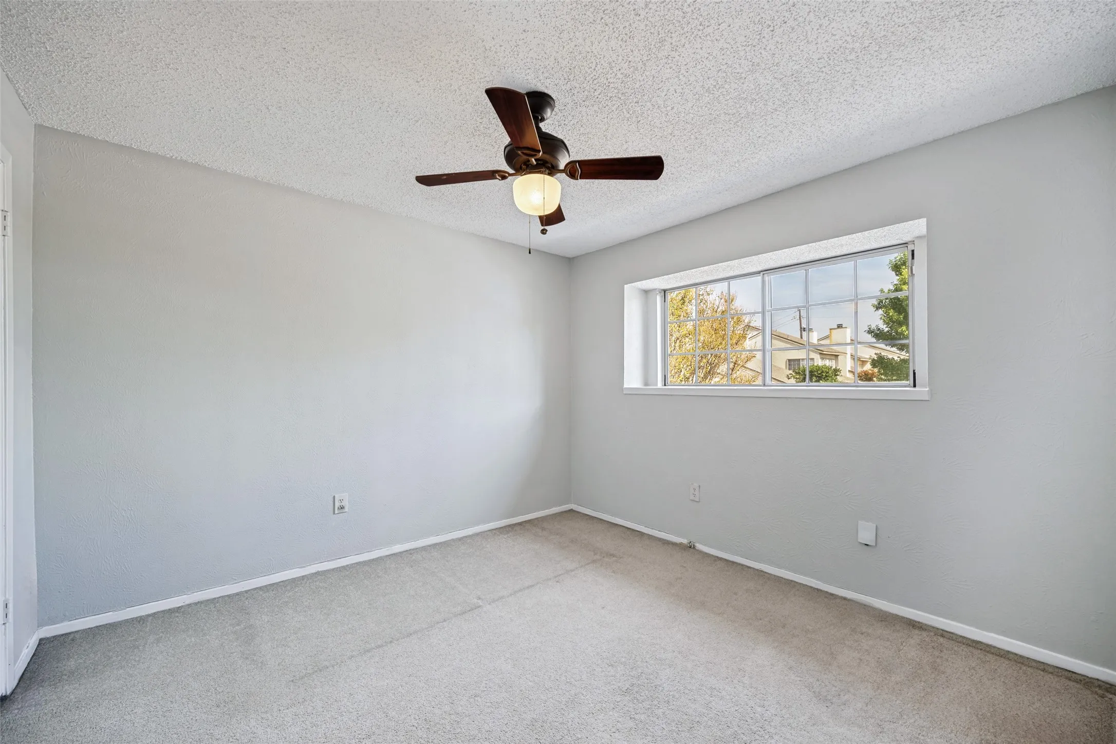 Bedroom #3 is upstairs and has a large window with deep window seal