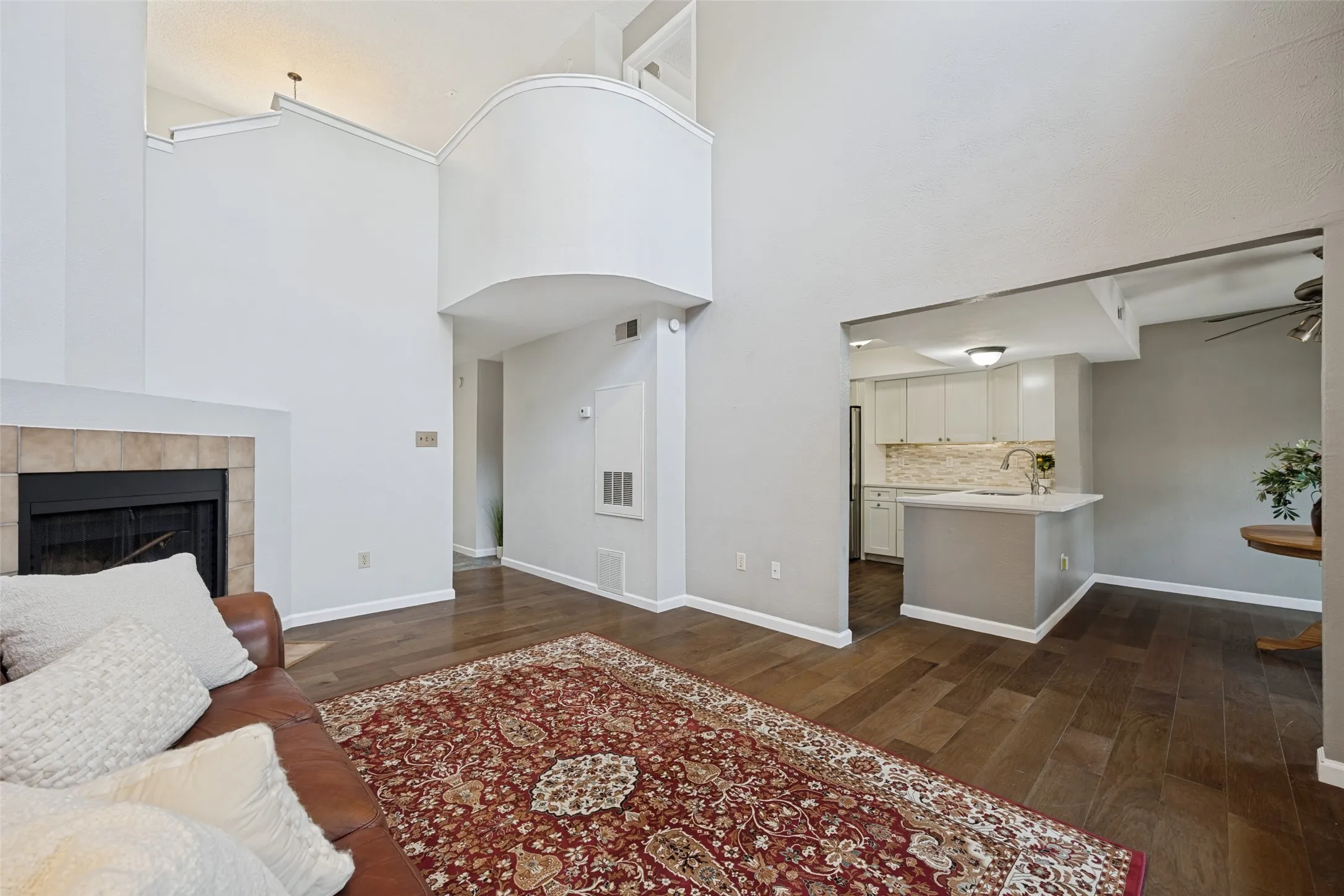 The living room is open to the dining area and kitchen