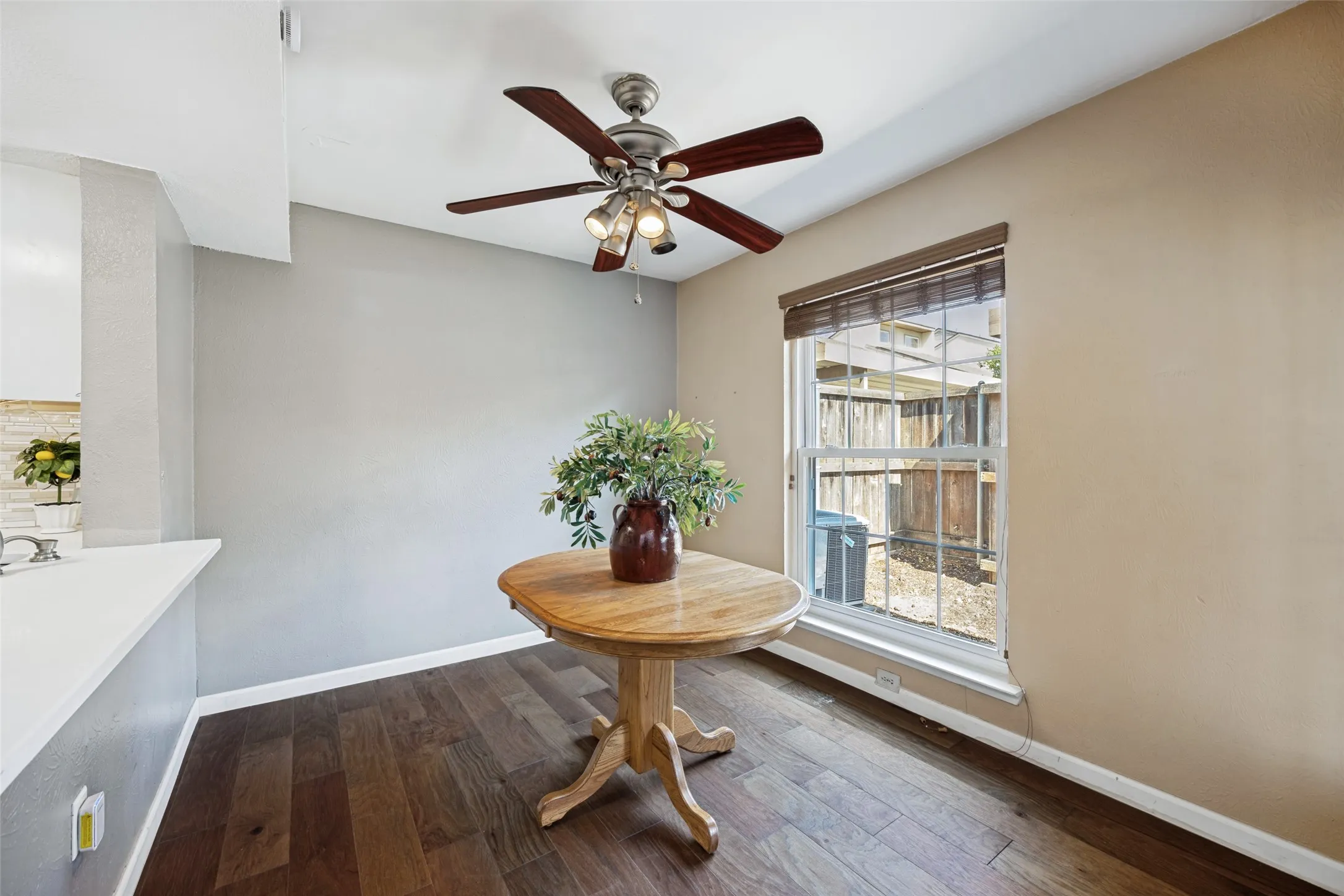 The dining area is light and bright thanks to the large window