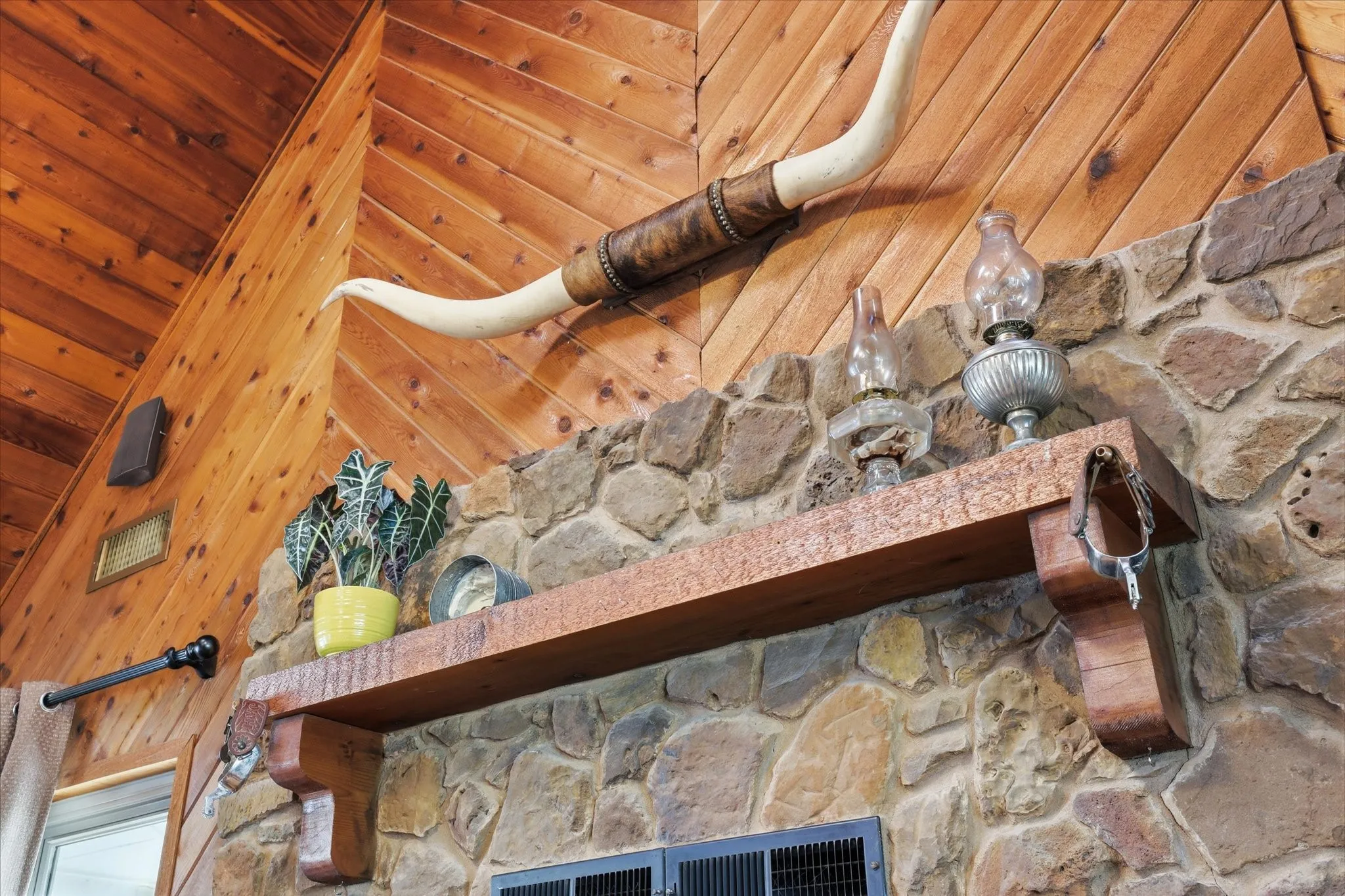 Custom stone and cedar mantel