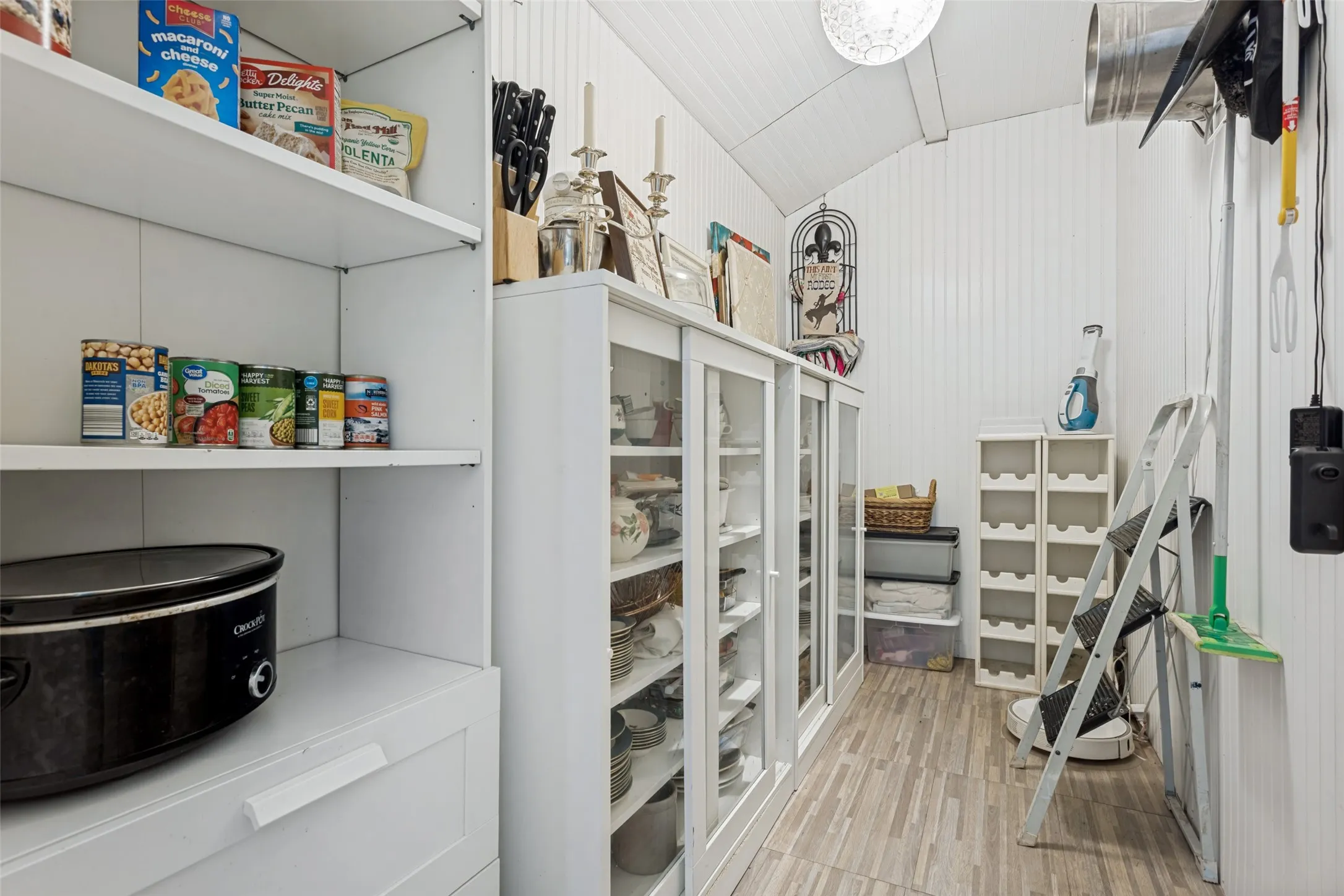 White storage shelving with built-in drawers