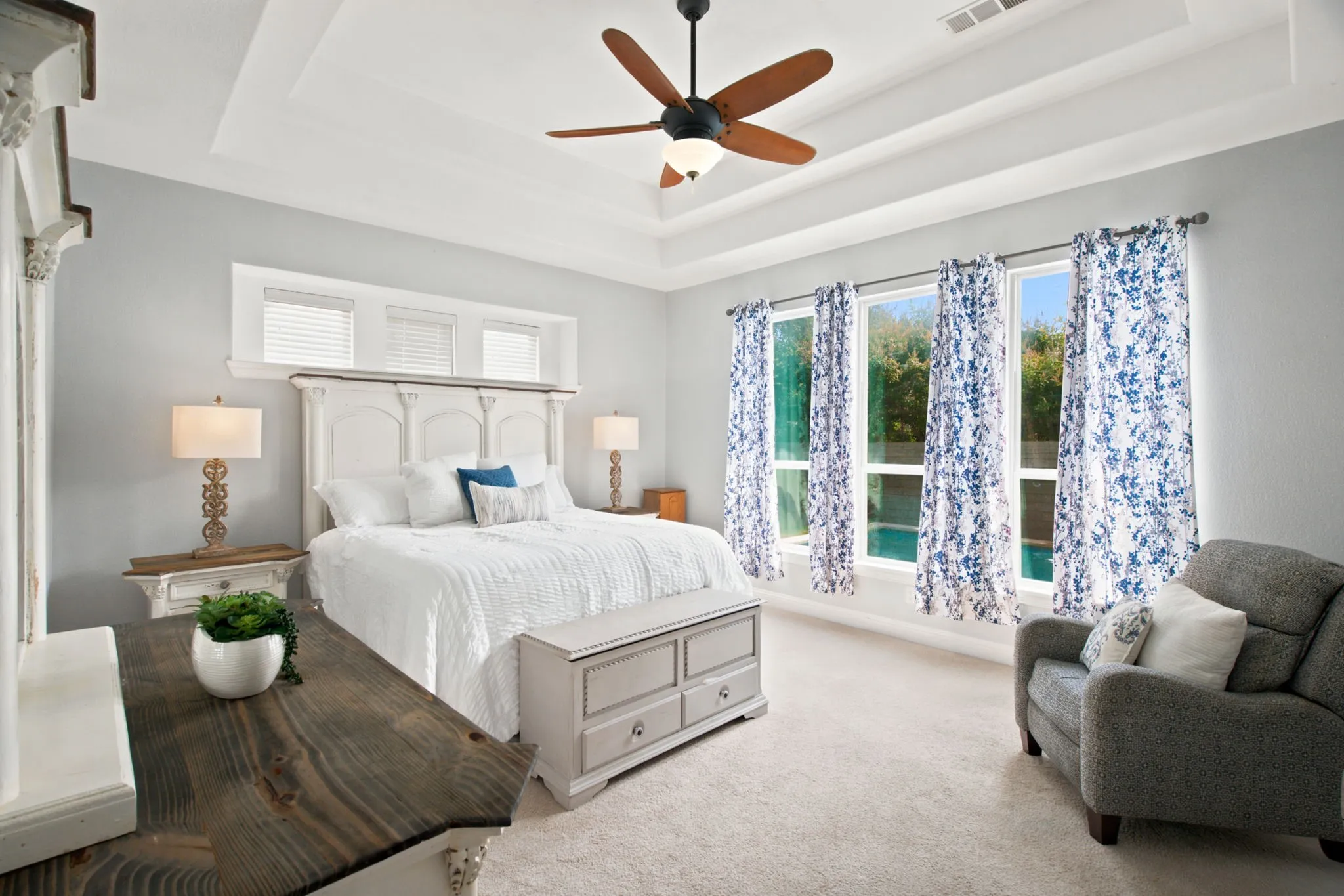 Primary bedroom brings in lots of natural light