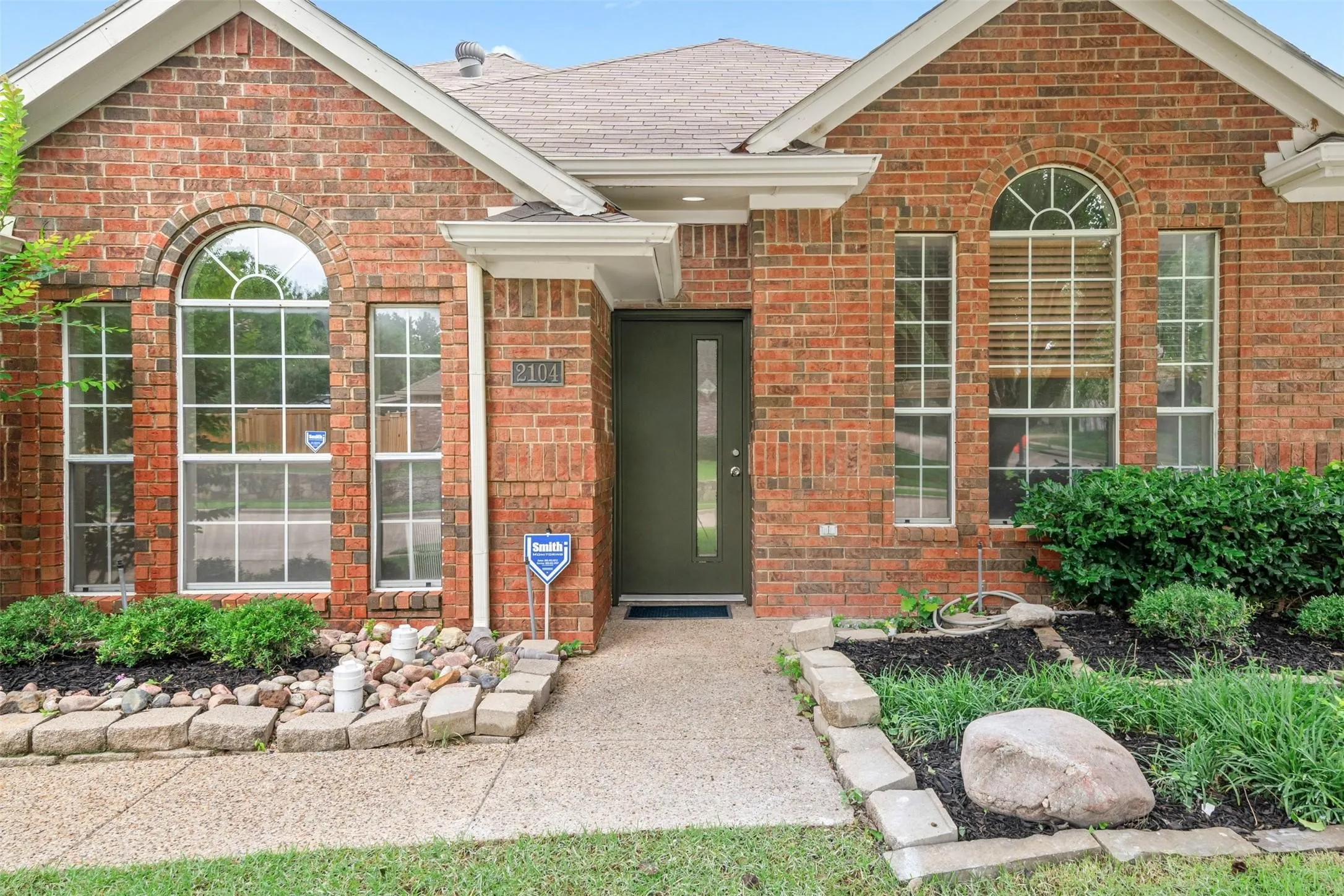 Brick exterior with gabled roofline