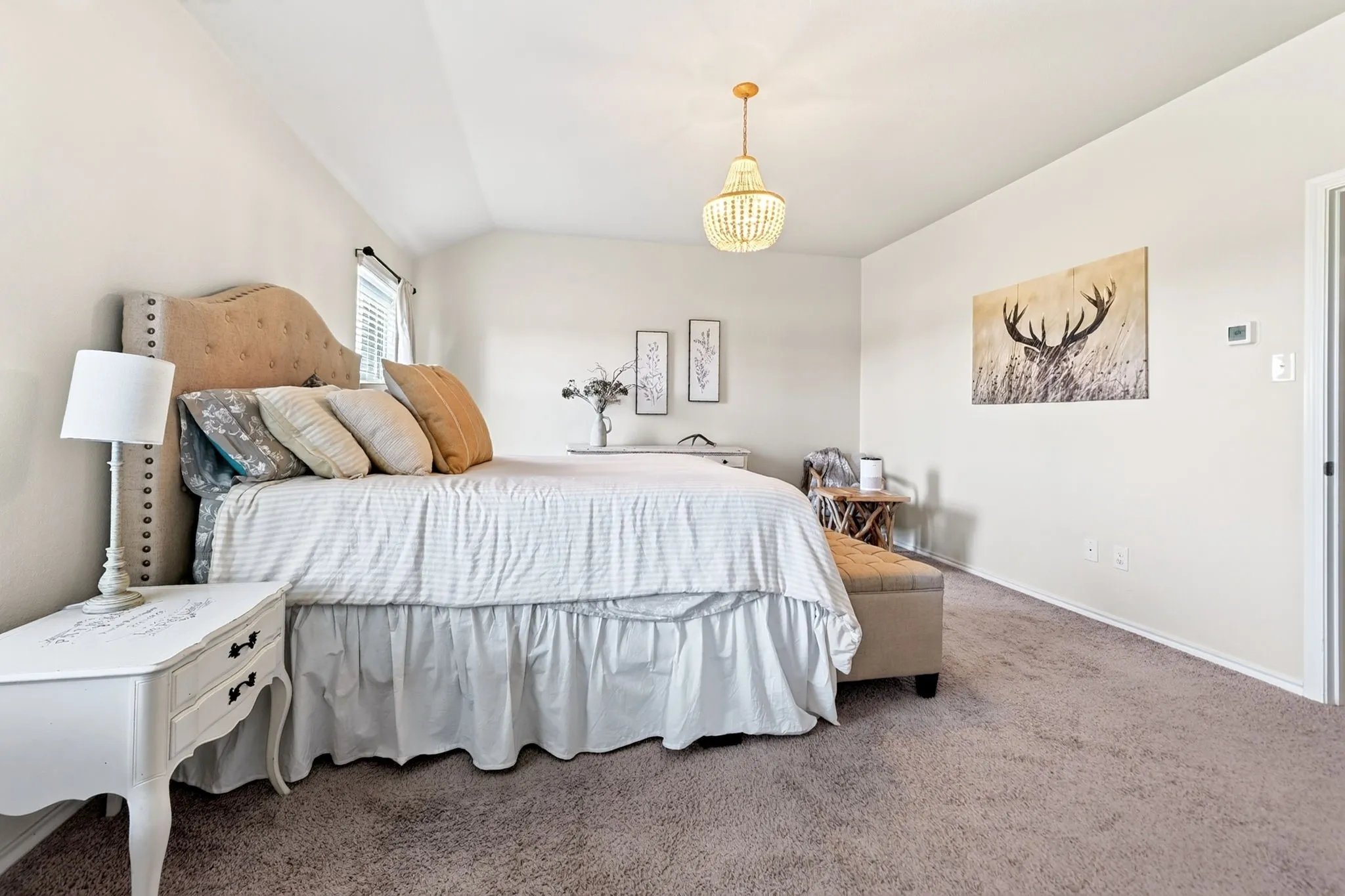 Neutral-toned carpeting throughout