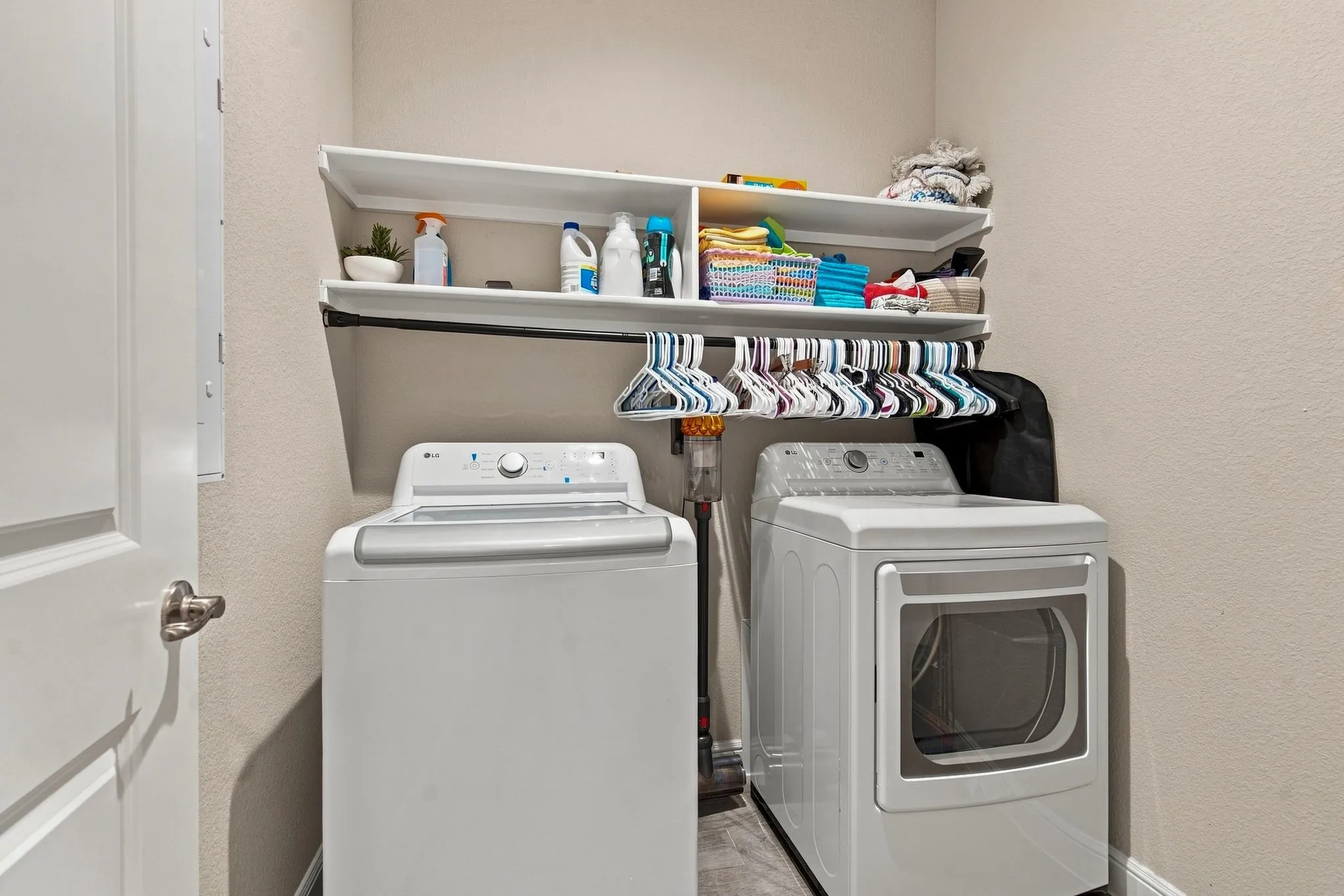 Built-in shelving with hanging rod, durable flooring