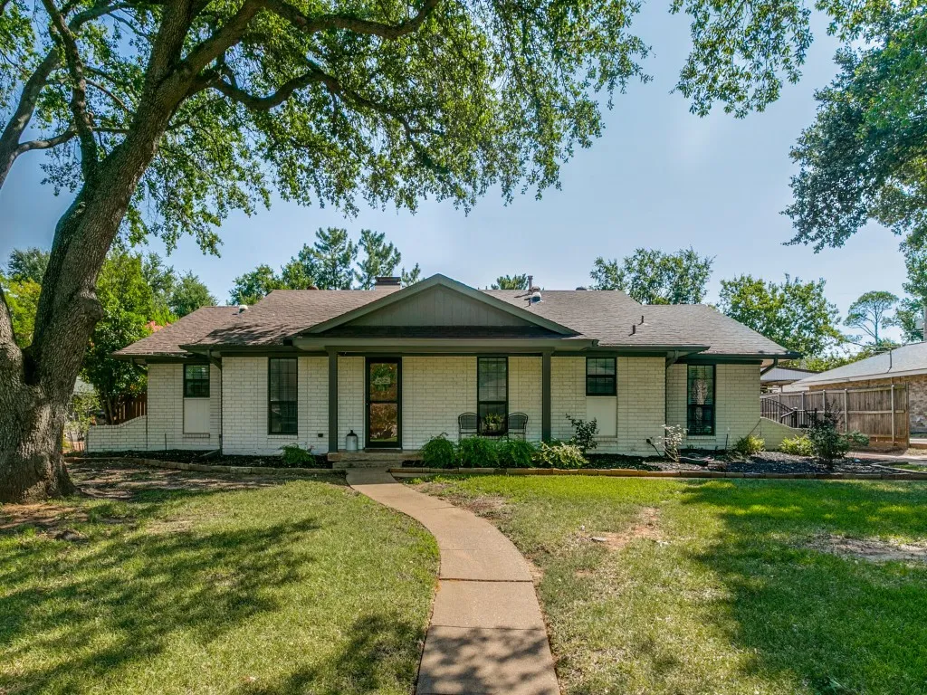 Towering mature trees provide shade and character throughout this well-established neighborhood.